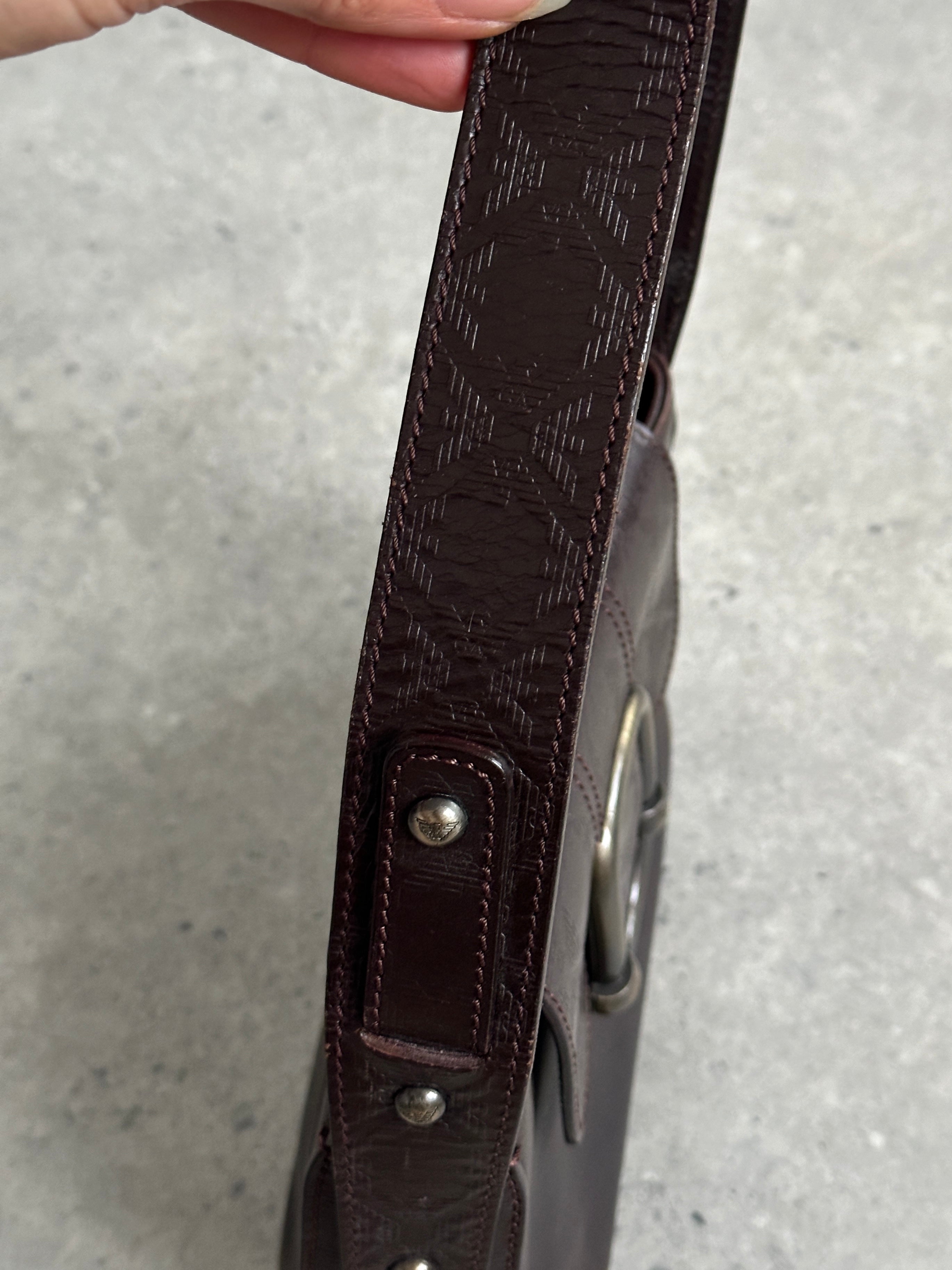 Emporio Armani leather shoulder bag with hardware monogram design, stylish accessory featuring a sleek silhouette and embossed logo.