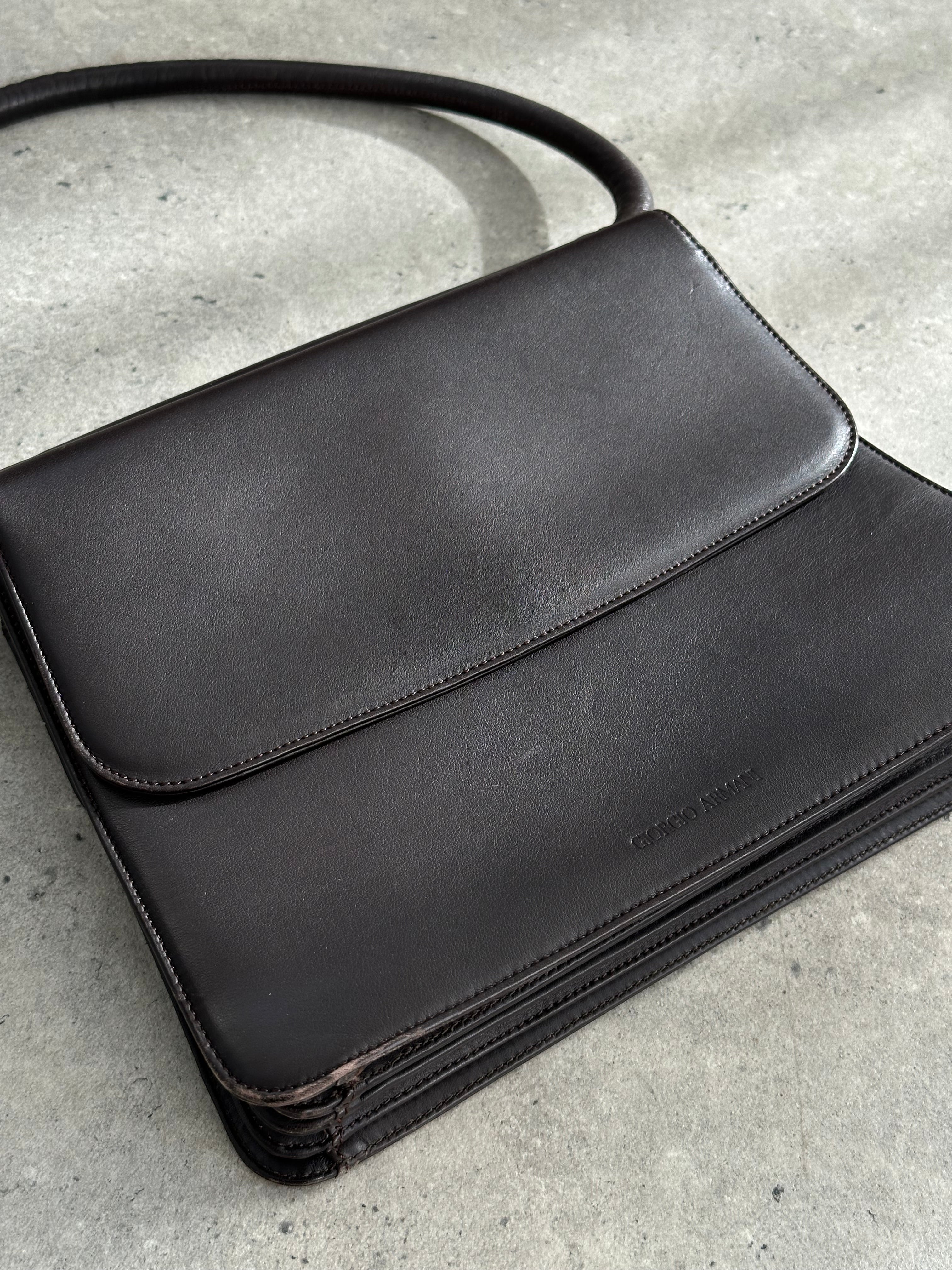 Giorgio Armani Le Collezioni leather shoulder bag in black with sleek design and silver hardware for elegant everyday use