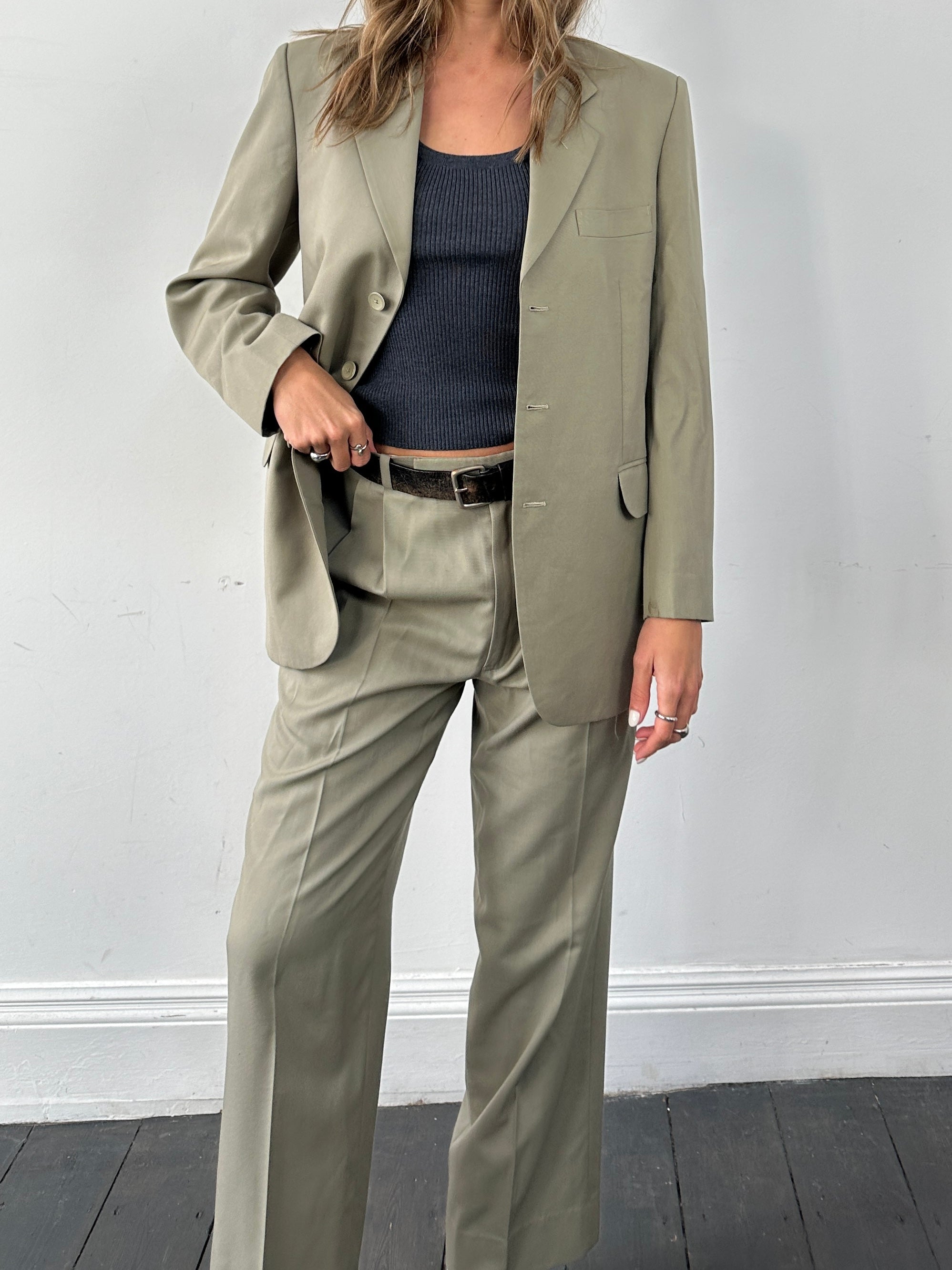 Vintage wool single-breasted jumpsuit in size 40R/W30, tailored with classic suit features and a vintage style.