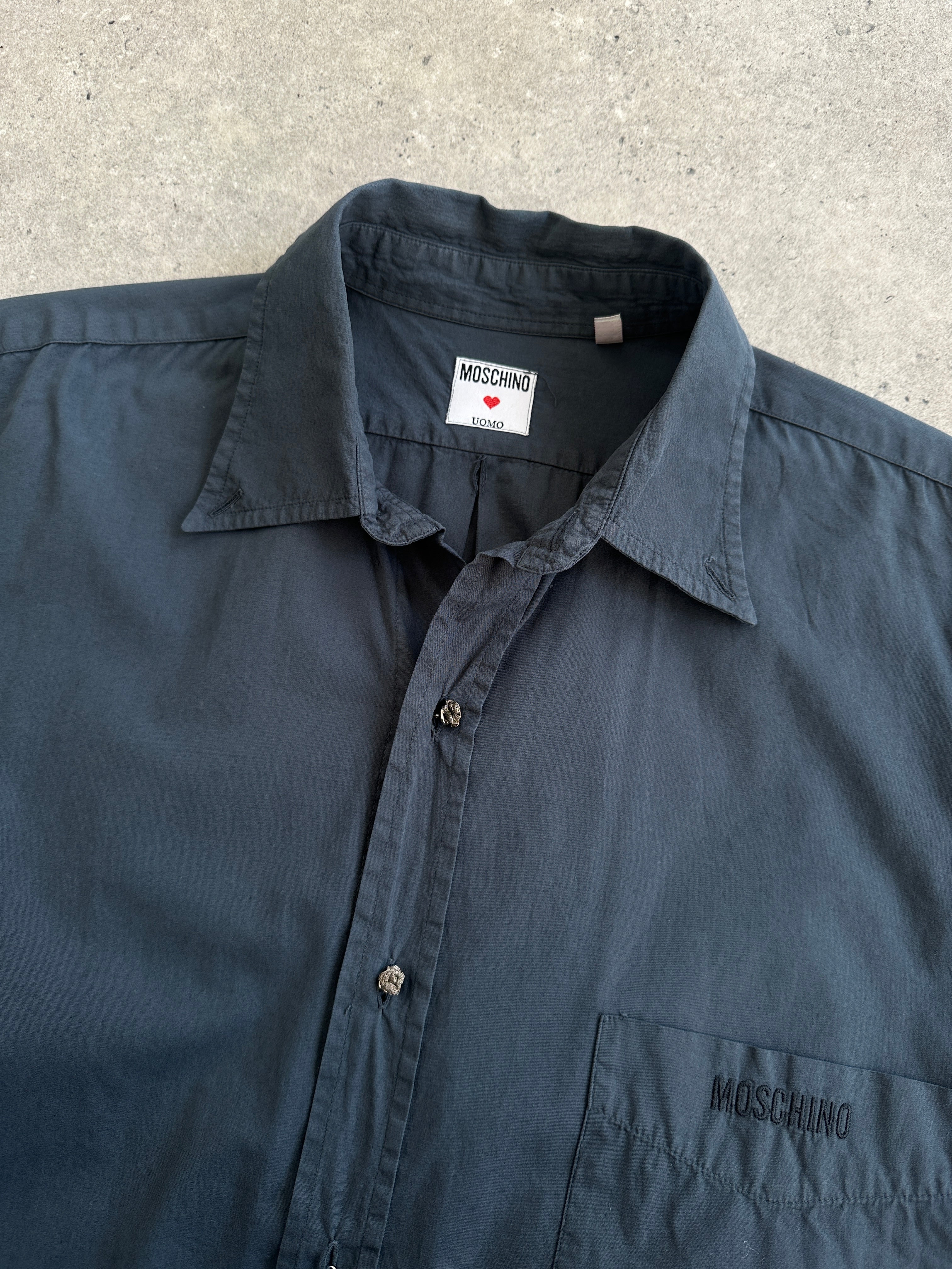 Moschino pure cotton bespoke button logo shirt in size L, featuring a stylish classic fit with signature branding details.