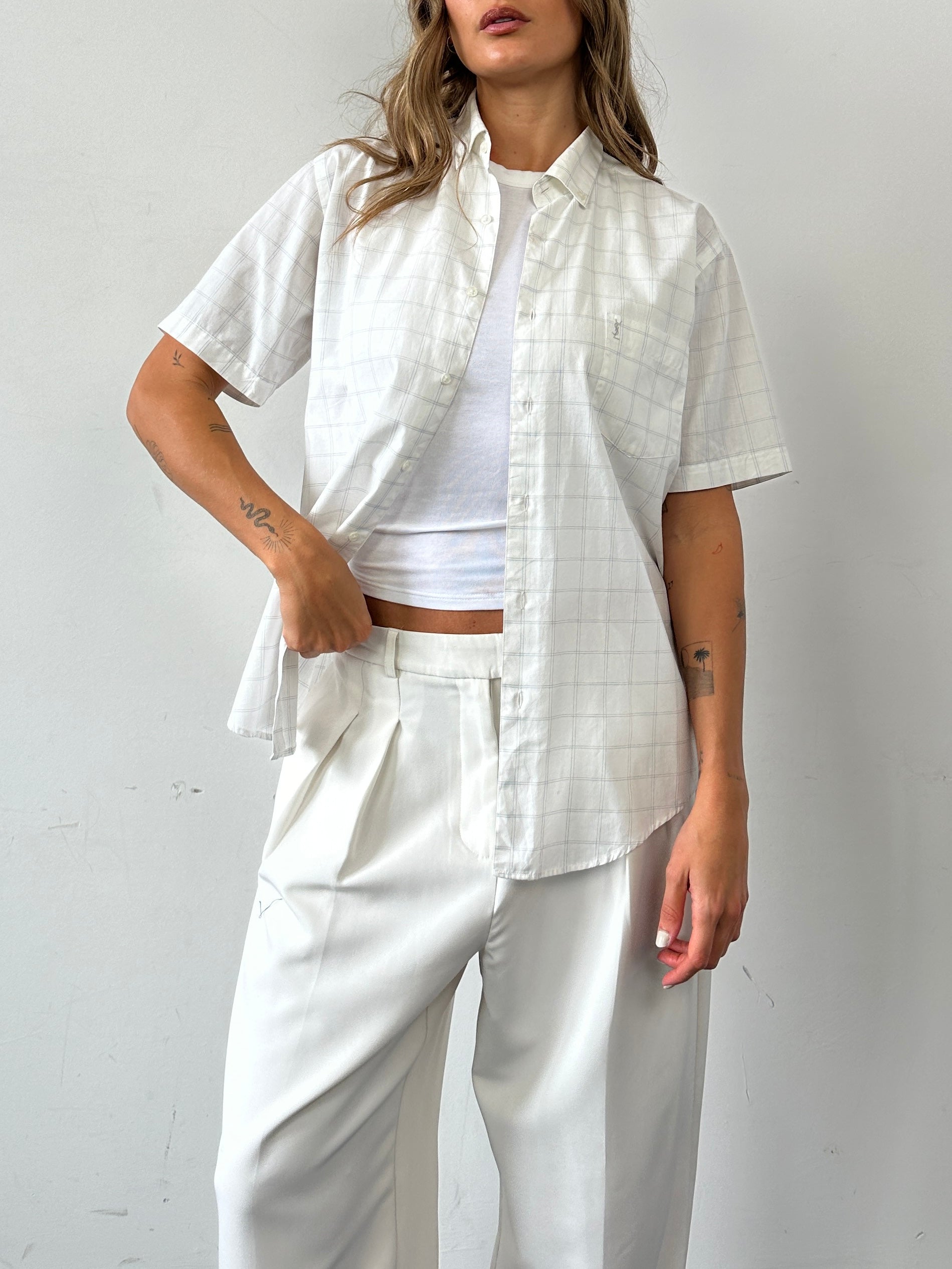 Yves Saint Laurent cotton check logo shirt in size M, featuring classic check pattern and YSL branding on the front.