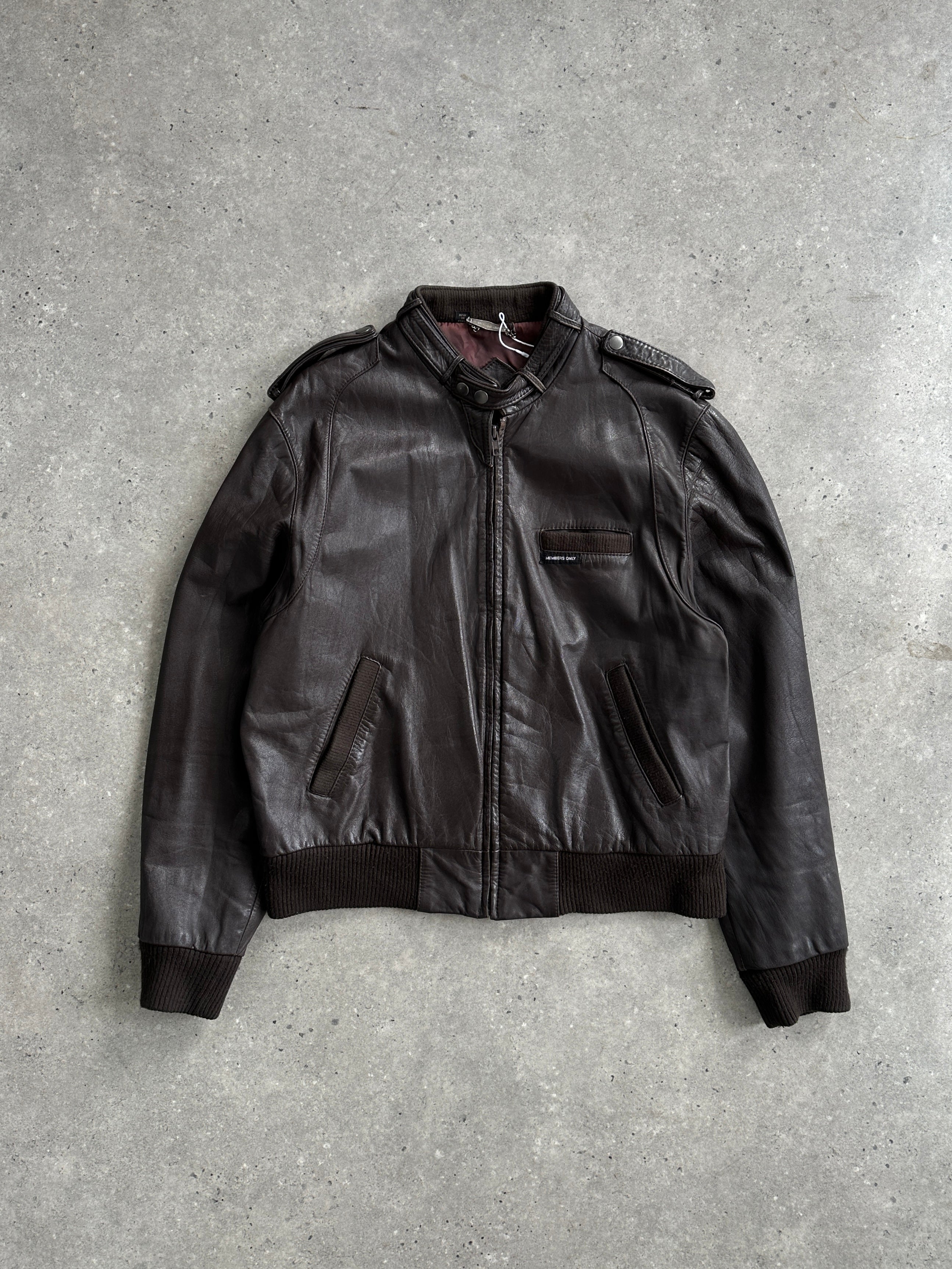 Vintage Moto Leather Bomber Jacket in size M featuring classic design, black leather exterior, and ribbed collar and cuffs.