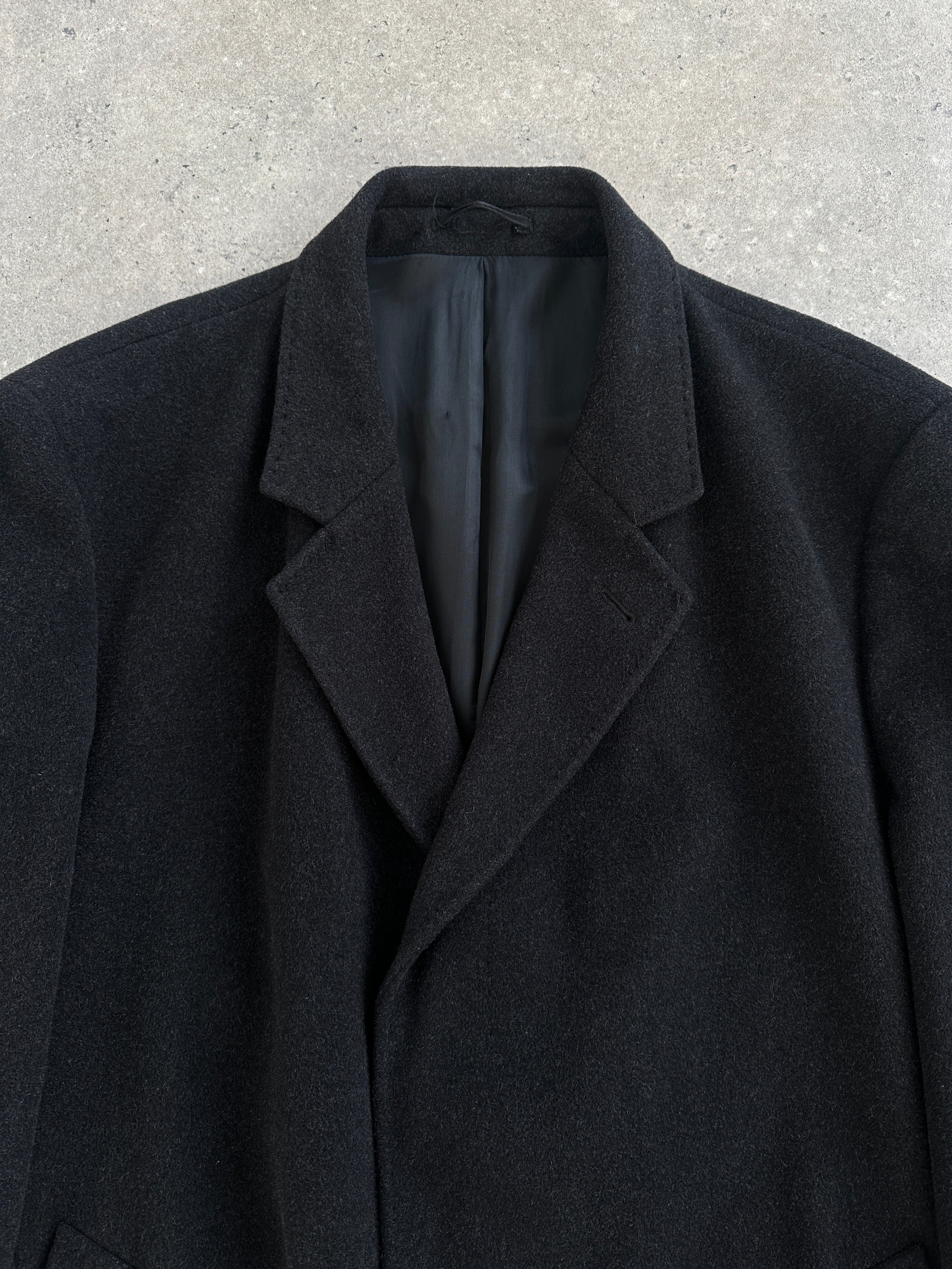 Vintage 1990s cashmere wool coat with concealed placket, oversized XXL/XXXL, showcasing classic style and textured fabric.