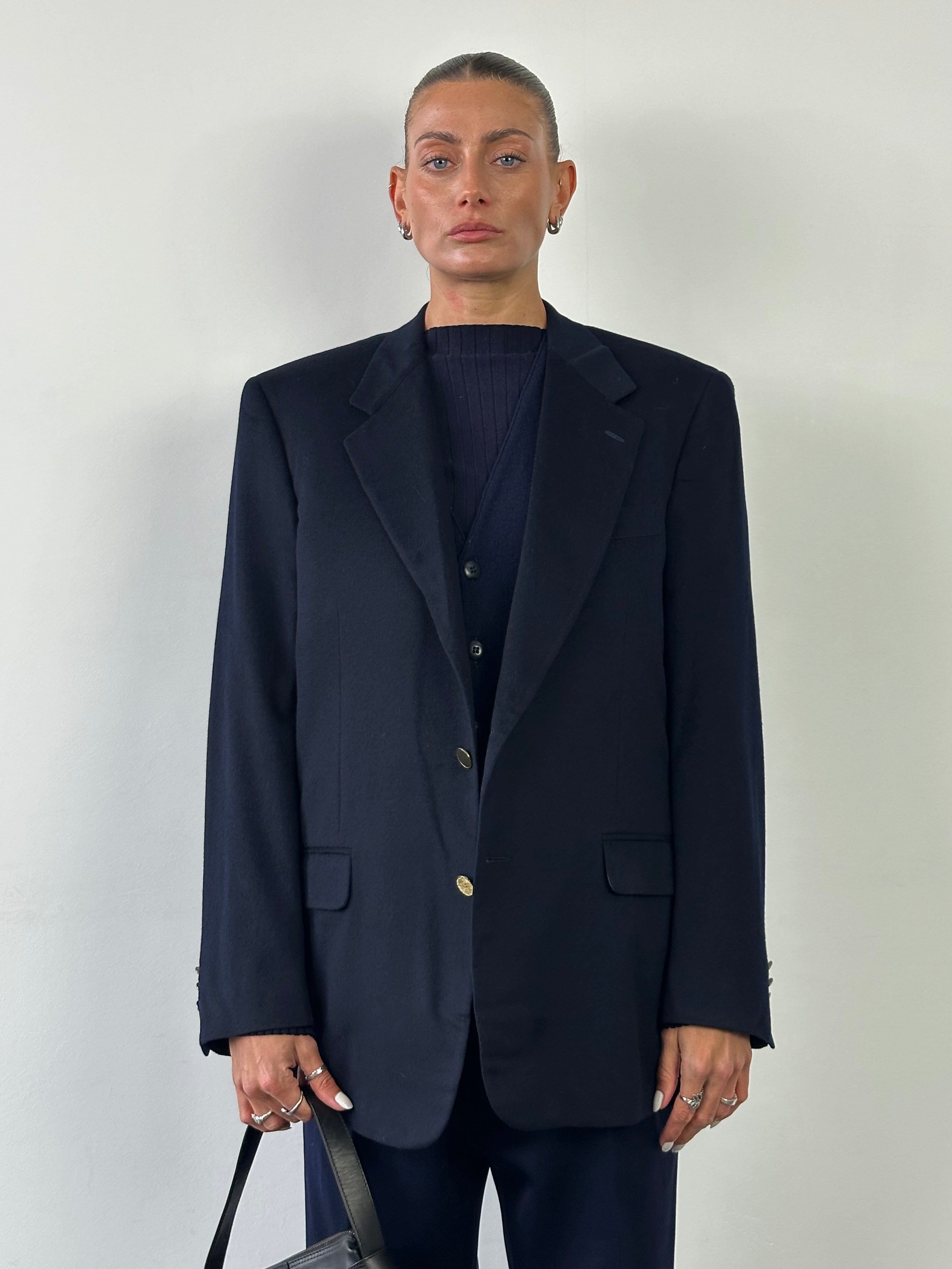 Loro Piana brushed wool single-breasted blazer in size L, tailored fit, dark neutral color, shown on a mannequin.