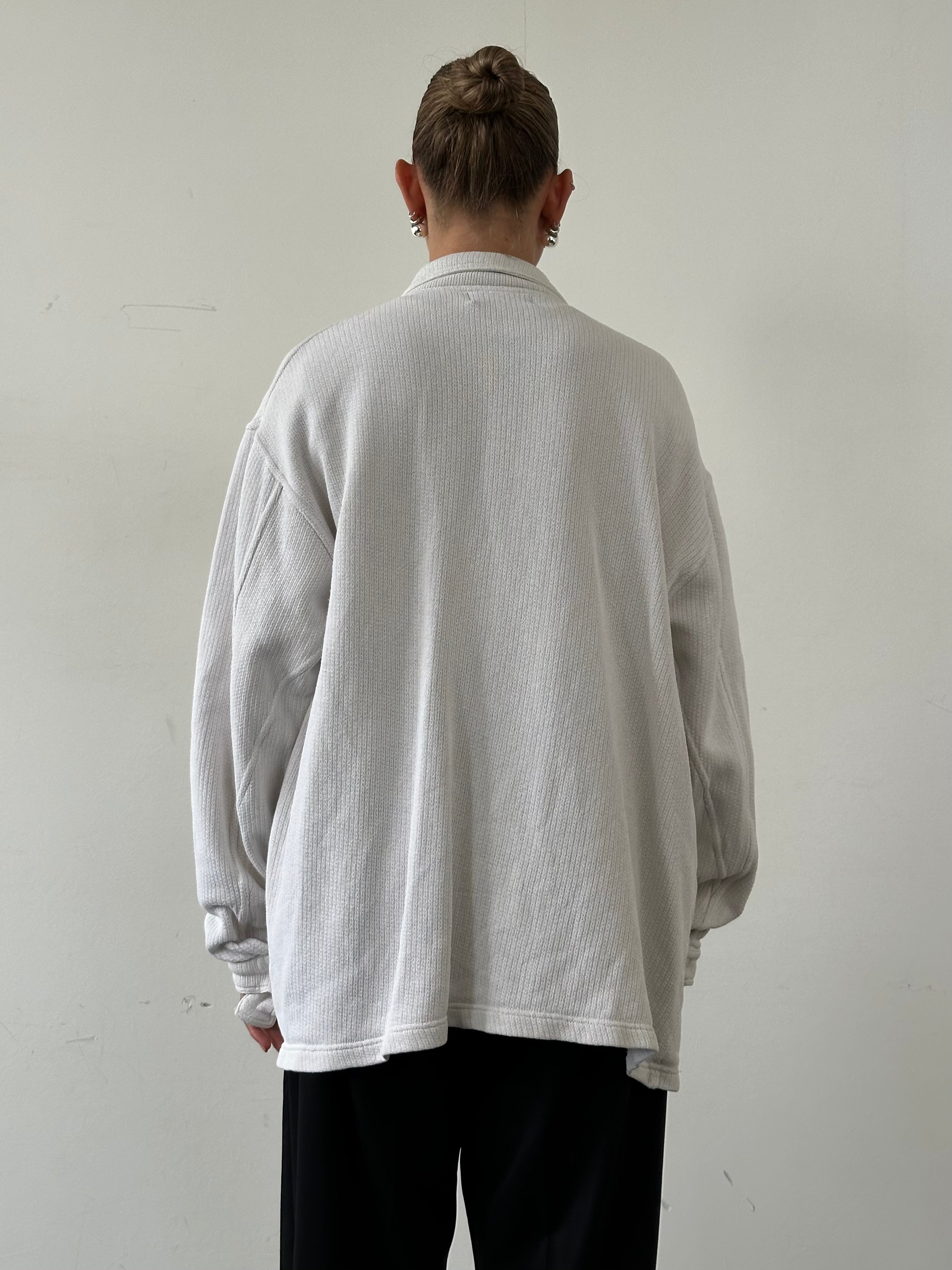 Avirex heavyweight pure cotton over shirt in XXL style, displayed on a hanger with visible button details and classic design.