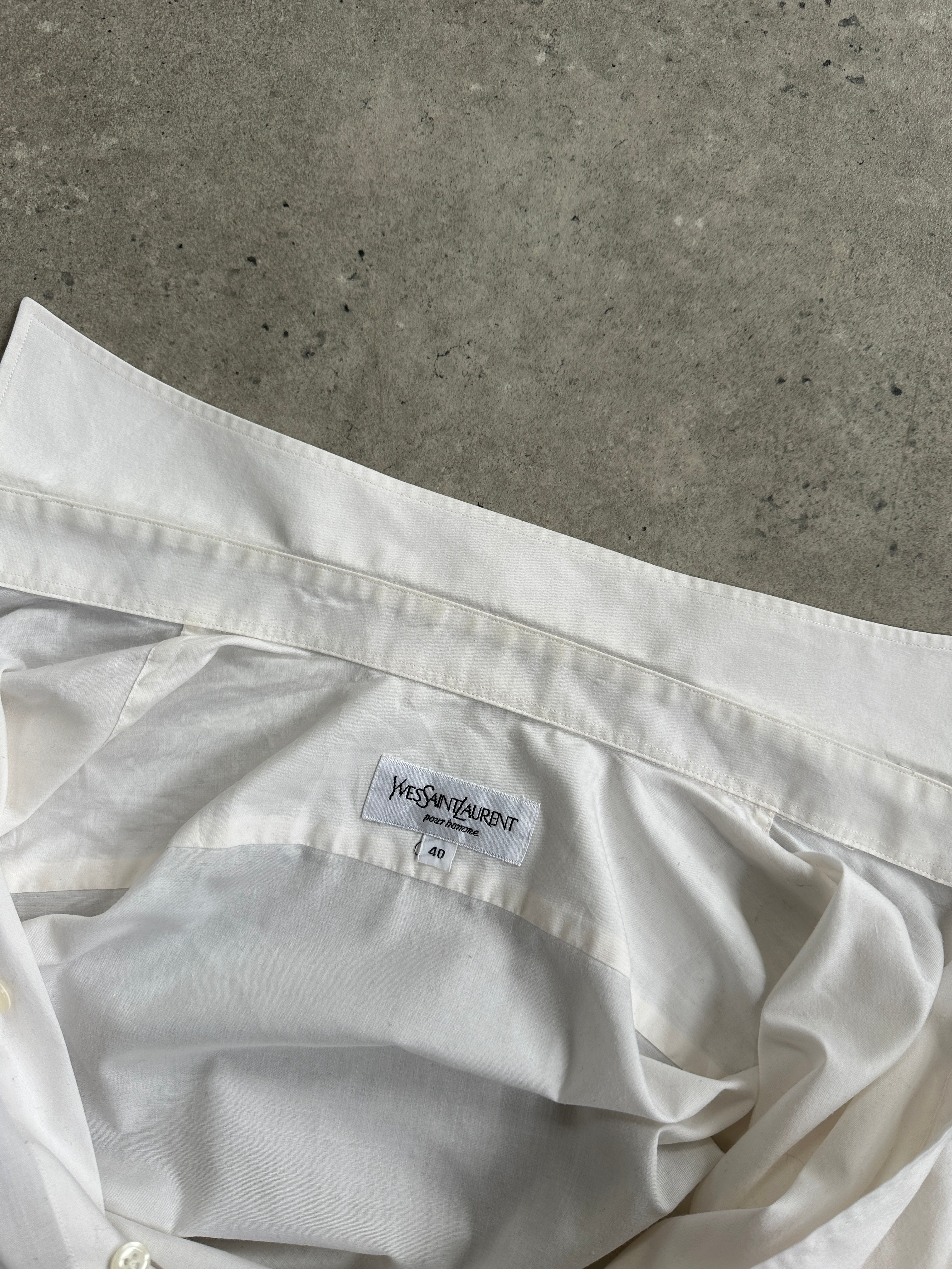 Yves Saint Laurent Pour Homme 1990s white cotton dress shirt with logo detail, long sleeves, and classic collar, size large.