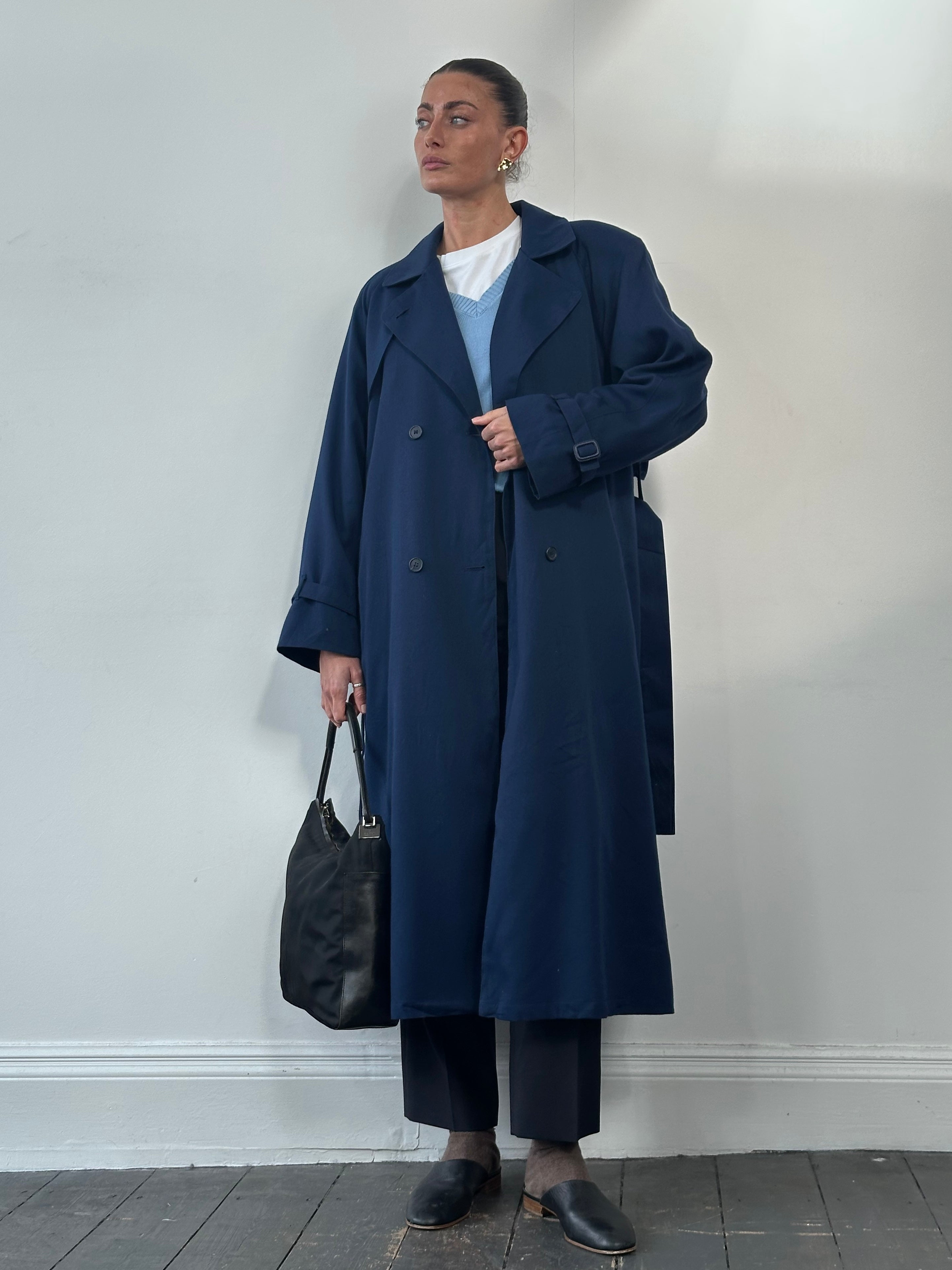 London Fog wool belted trench coat in XL, stylish and warm, shown on a hanger with classic beige color and tailored fit.