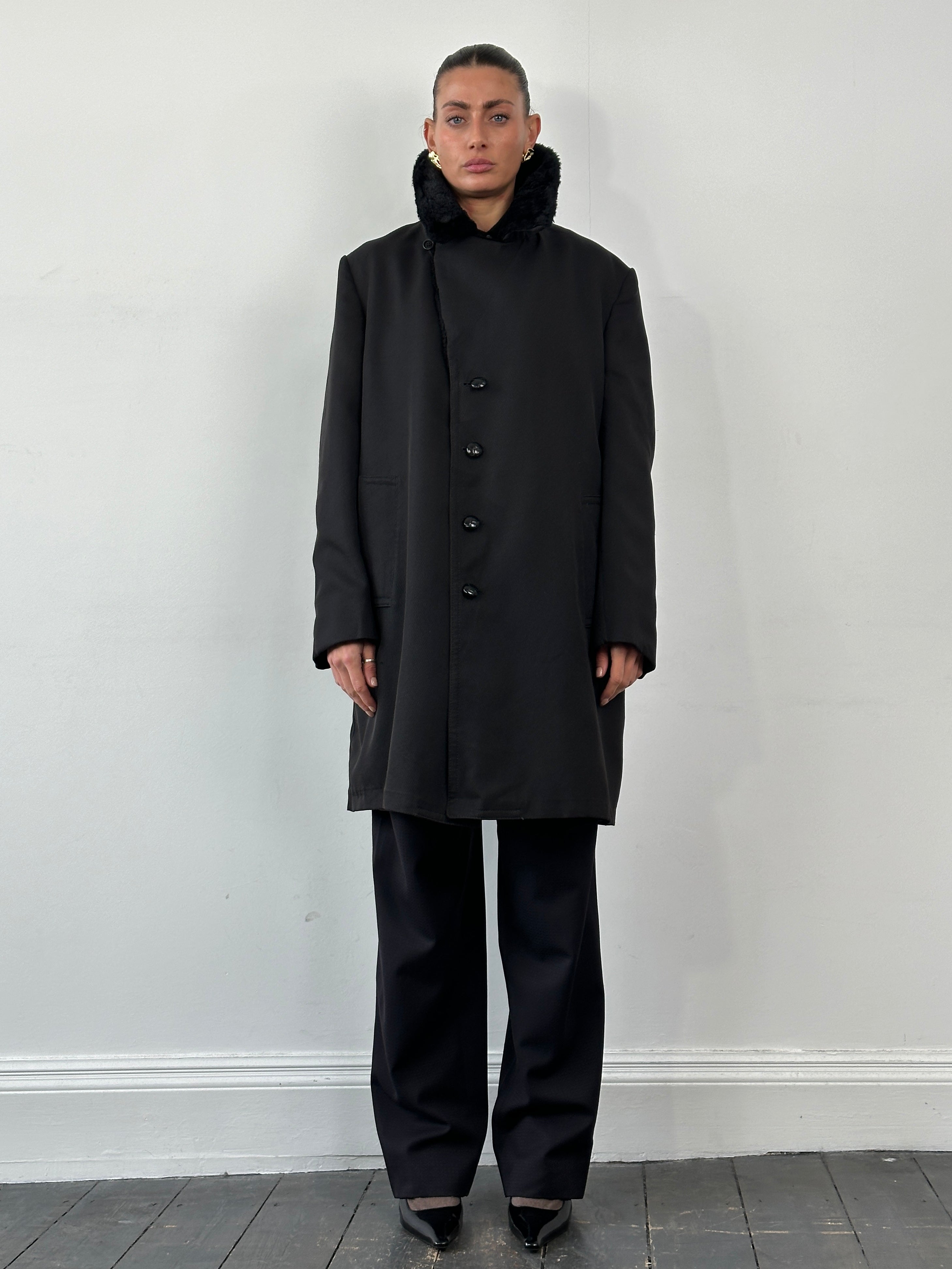 London Fog faux fur lined trench coat in XL, showcasing the stylish outerwear with a plush fur lining and classic design.