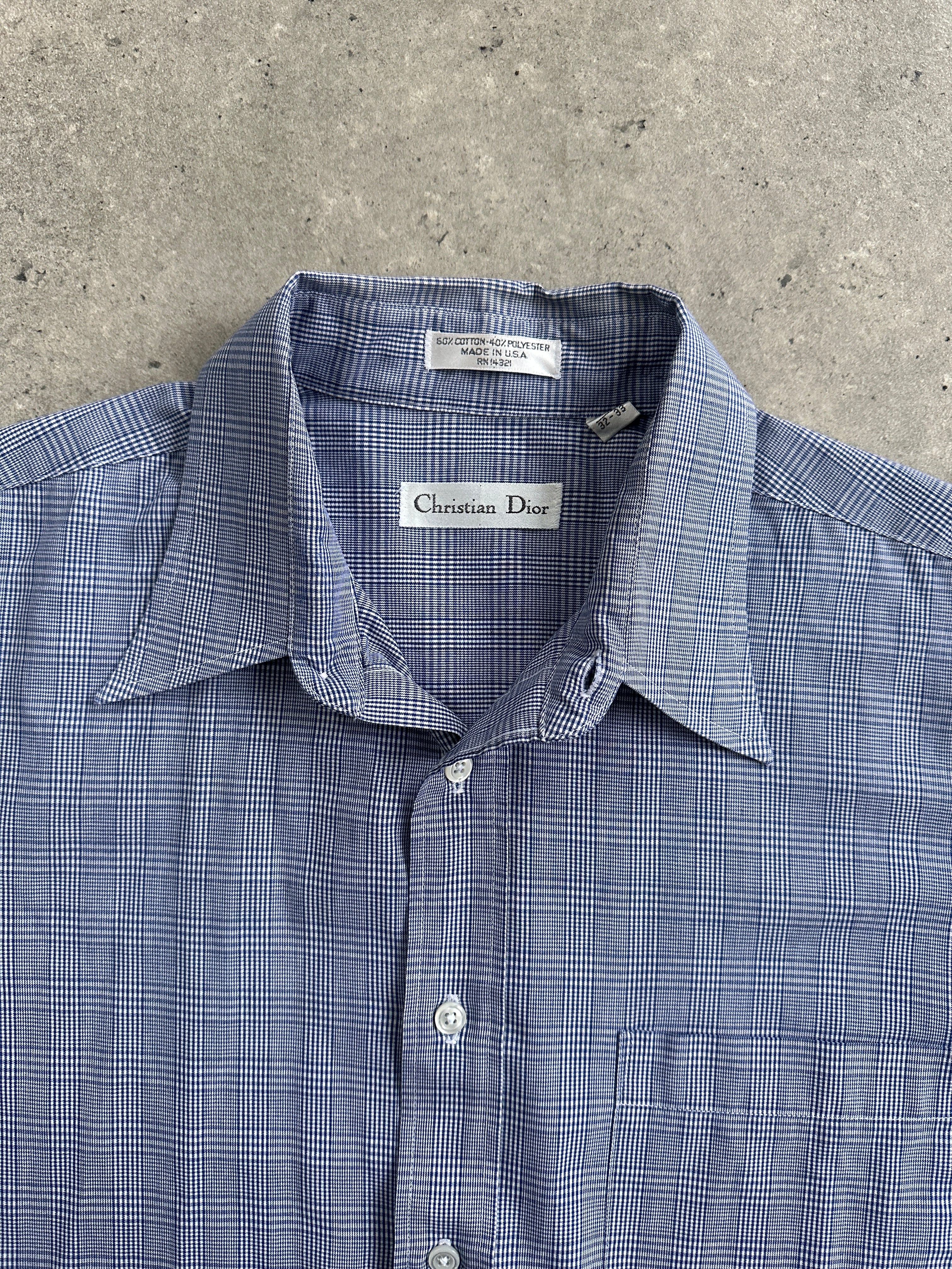 Christian Dior cotton check shirt in size L, featuring a classic plaid design and button-down front.