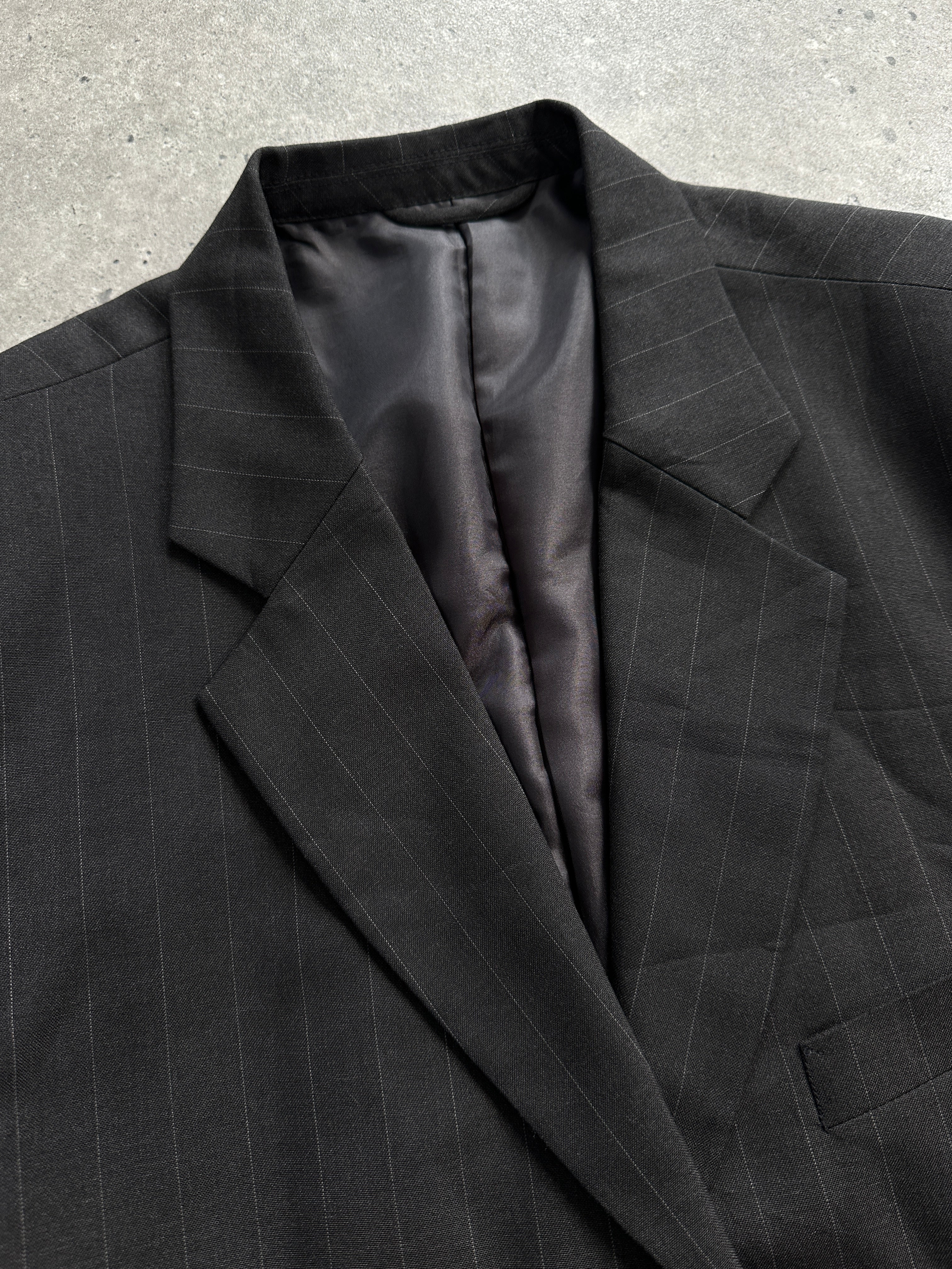 Vintage pinstripe wool single-breasted blazer in size 44R/XXL, featuring classic lapels and tailored fit.