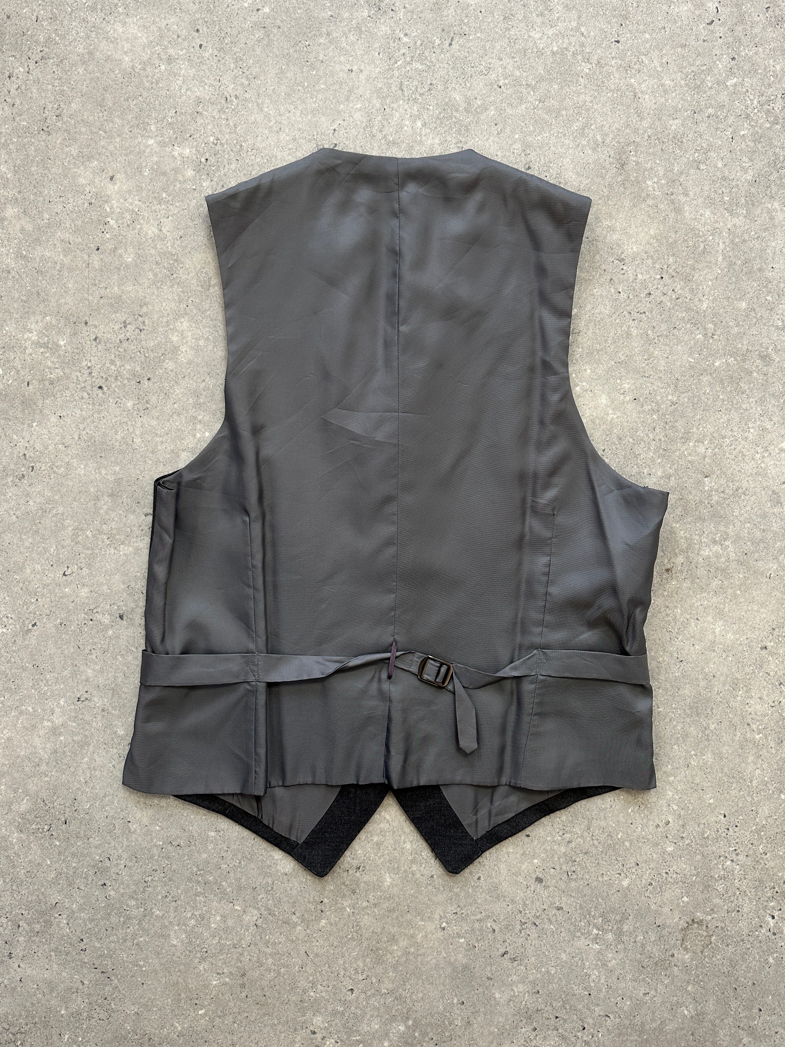 Vintage brand vintage wool waistcoat with a classic collared design, size M, featuring a tailored coat style.