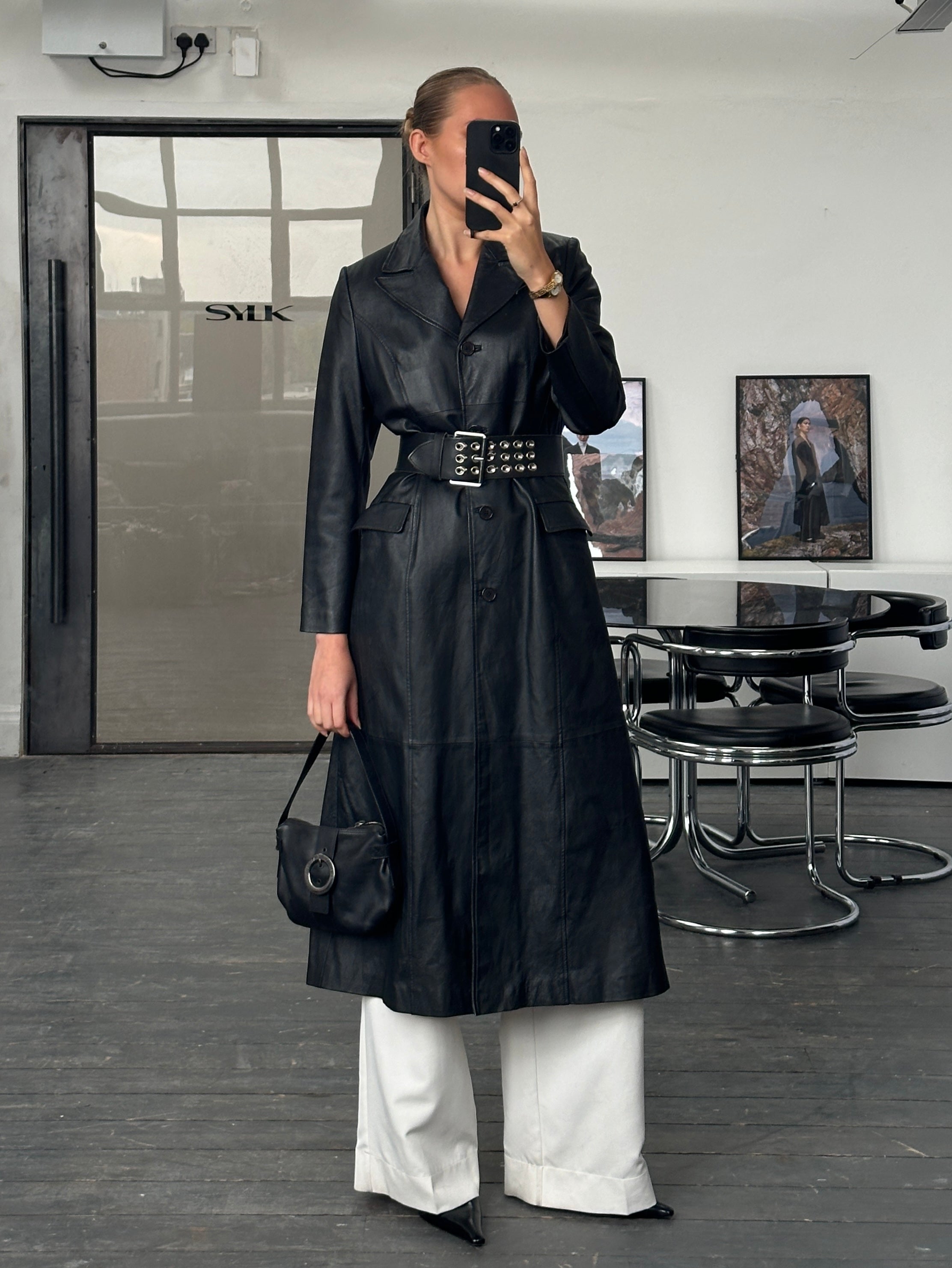 Vintage 1990s floor-length leather trench coat, black leather jacket with collar and belt, S/M size, vintage fashion style.