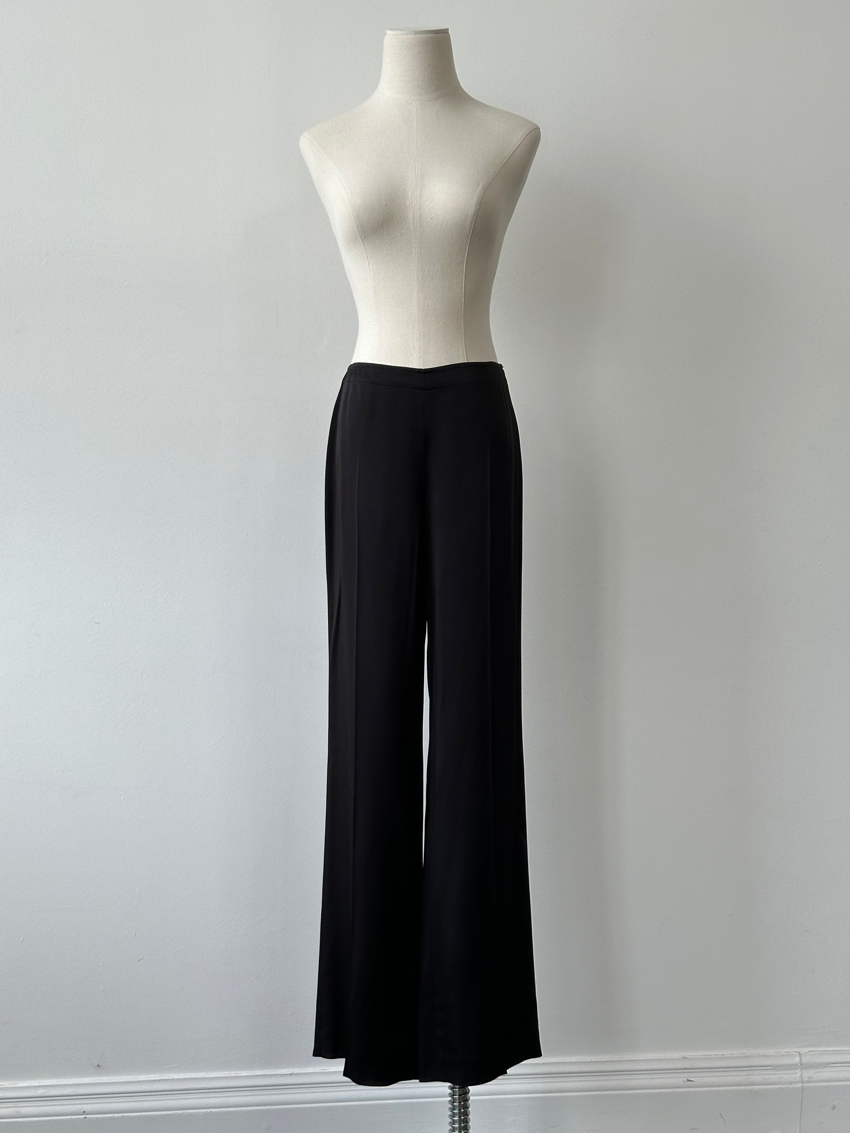 Marella 2000s loose straight-leg trousers in black, size W30, with a relaxed fit and classic waistband, laid flat.