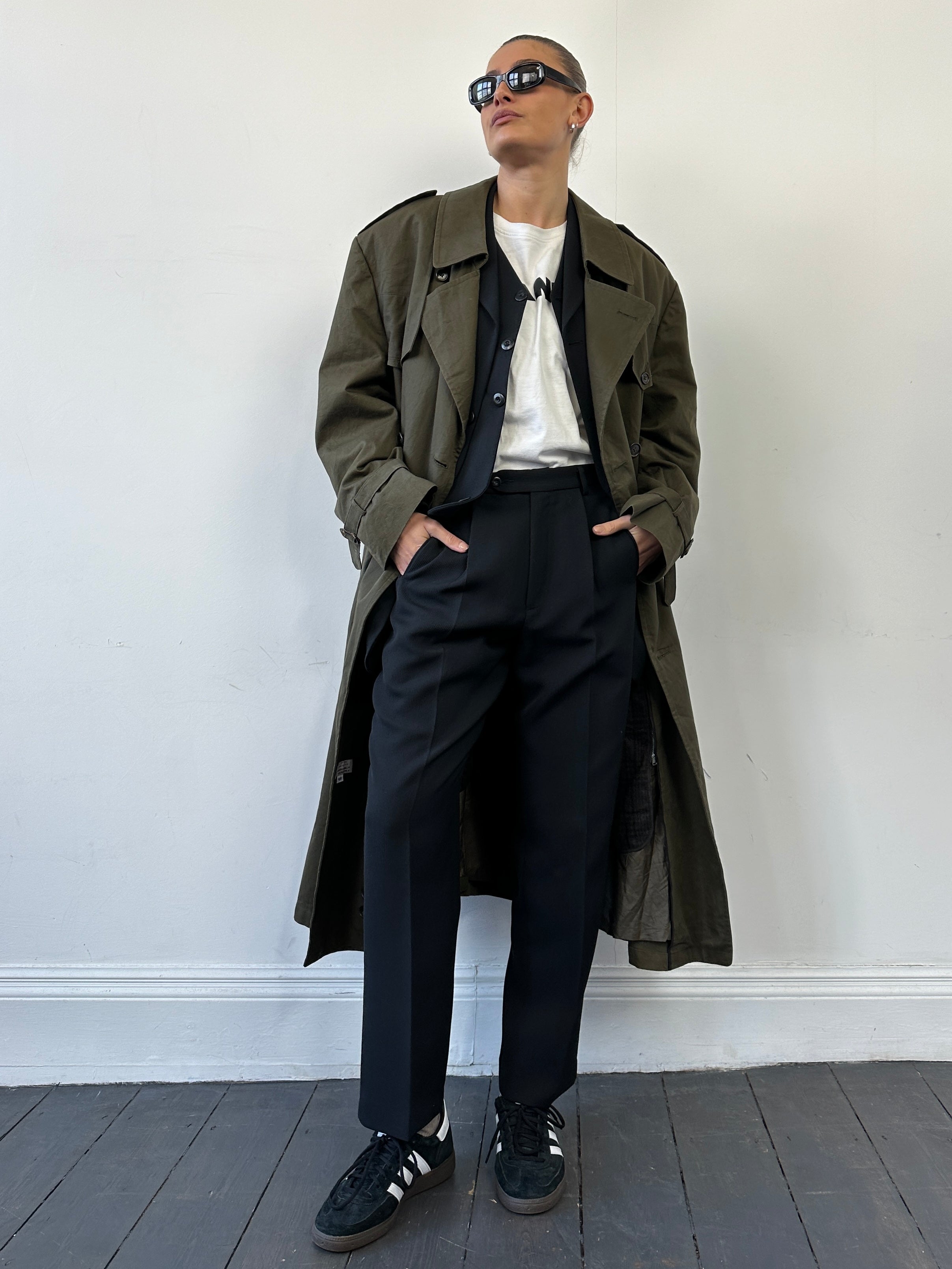 Christian Dior cotton double-breasted trench coat in XL, showing classic design with wide lapels and belt, on a neutral background.