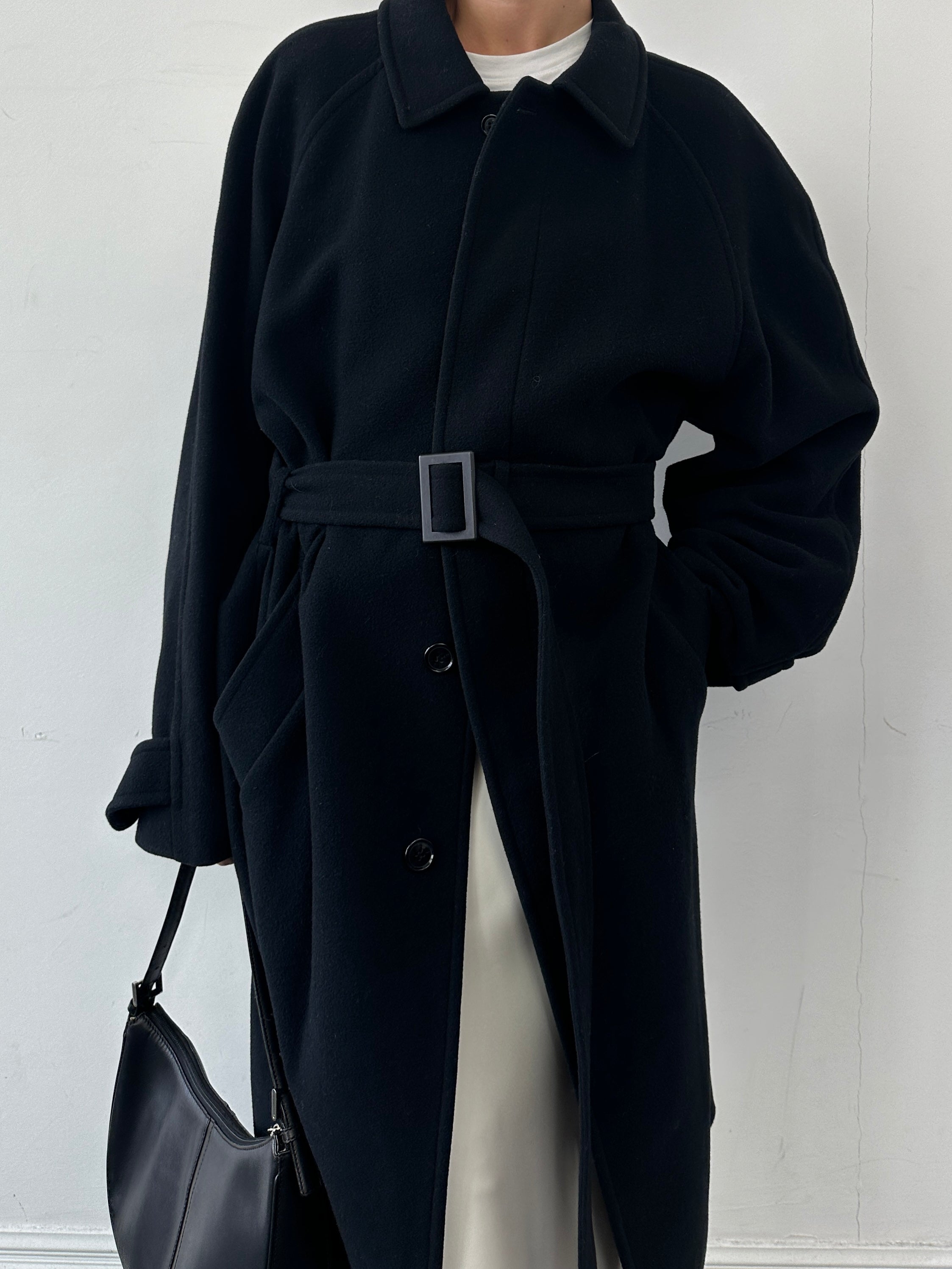 Vintage wool cashmere belted coat in XL with concealed placket, showcasing its classic design and textured fabric.
