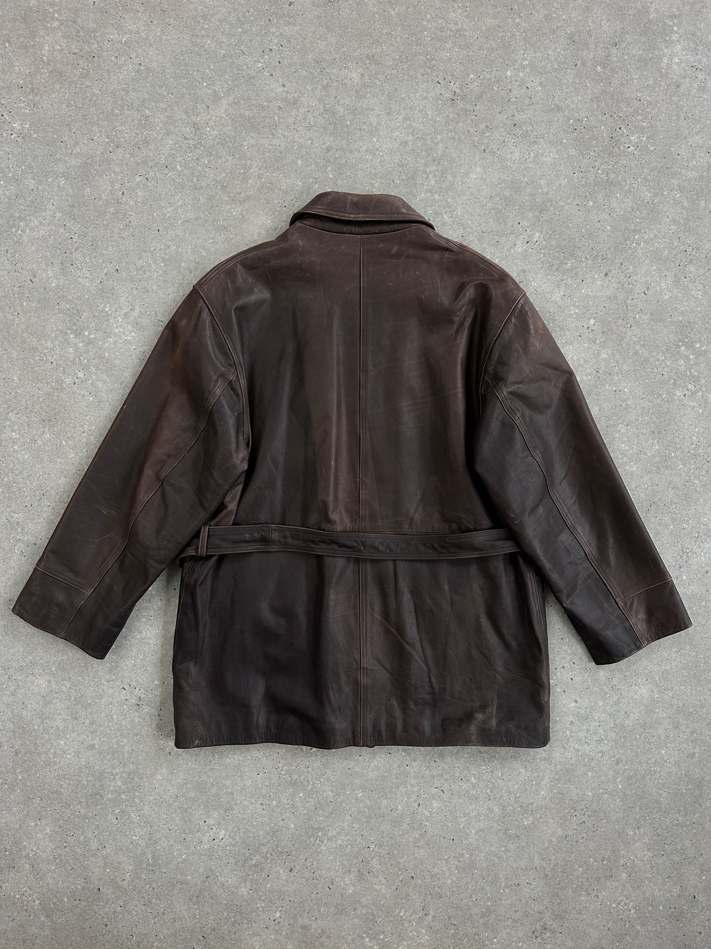 Vintage Italian 1990s belted leather jacket in XL, featuring aged leather and classic vintage style with front belt detailing.