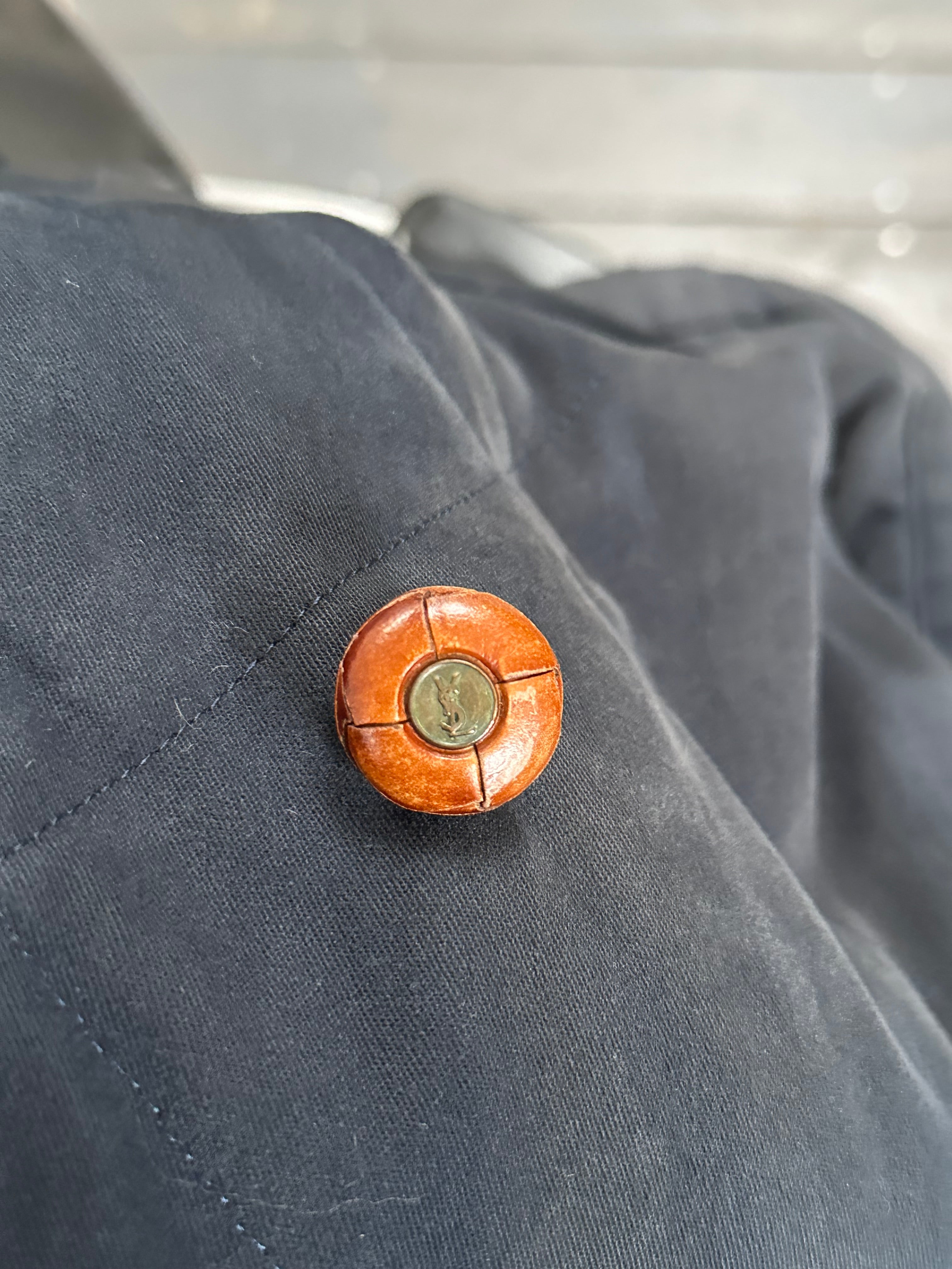 Yves Saint Laurent wool-lined jacket in XL with a tailored fit and classic design, shown on a hanger.