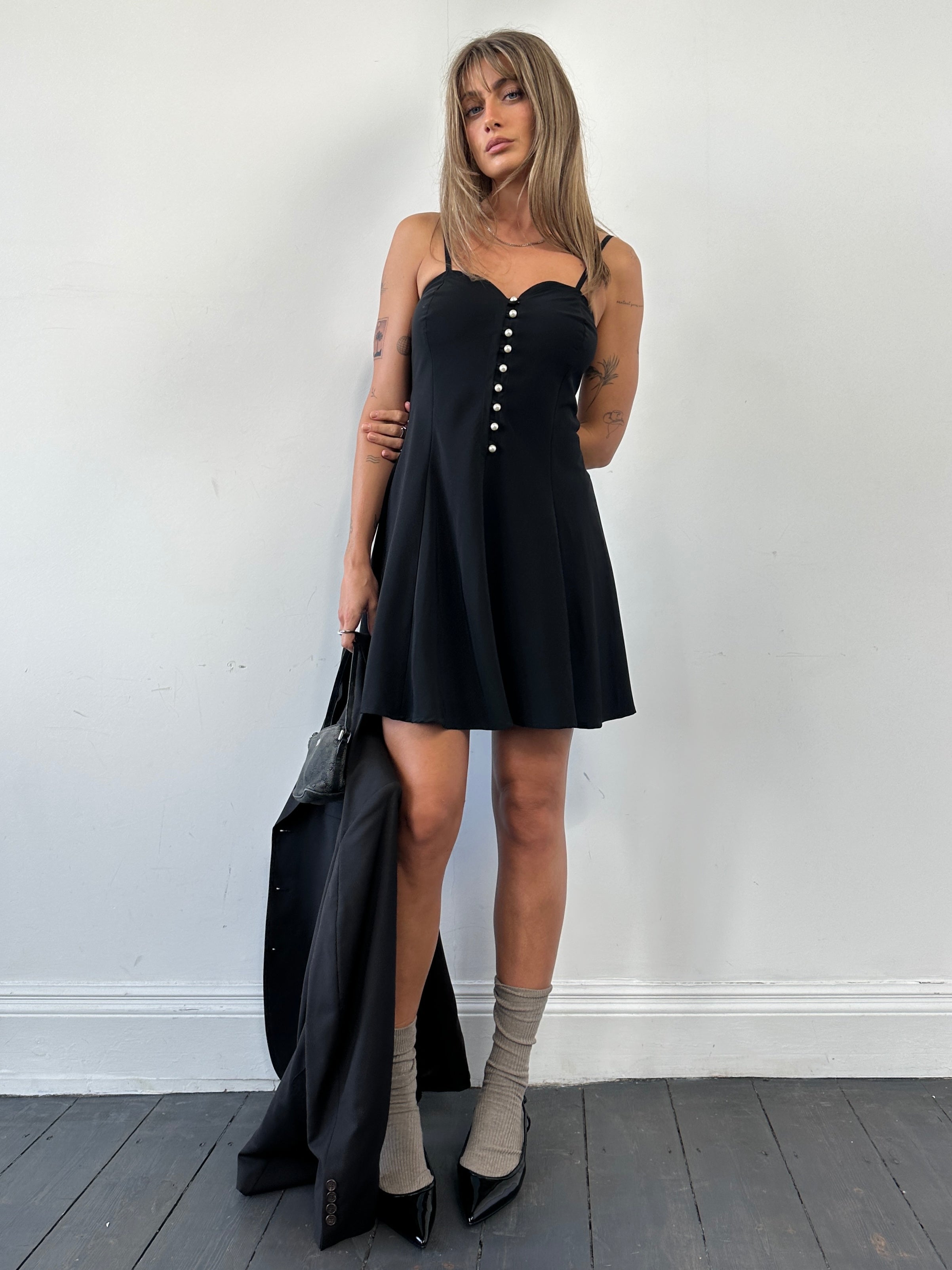 Vintage Italian vintage sweetheart neckline mini dress in size M, featuring a feminine design and classic style.