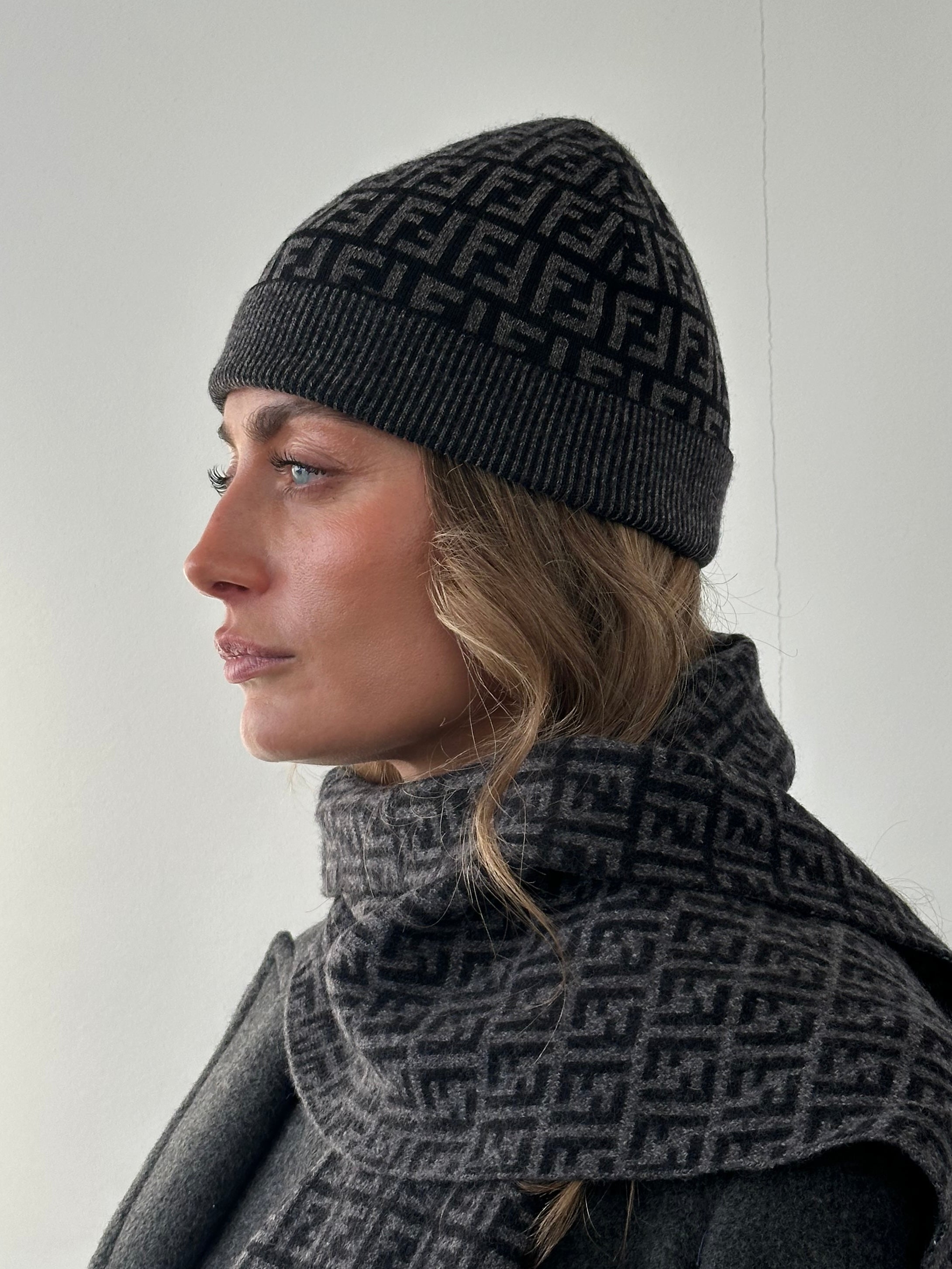 Fendi FF monogram print beanie hat in black and beige knit, stylish accessory with branded logo design.