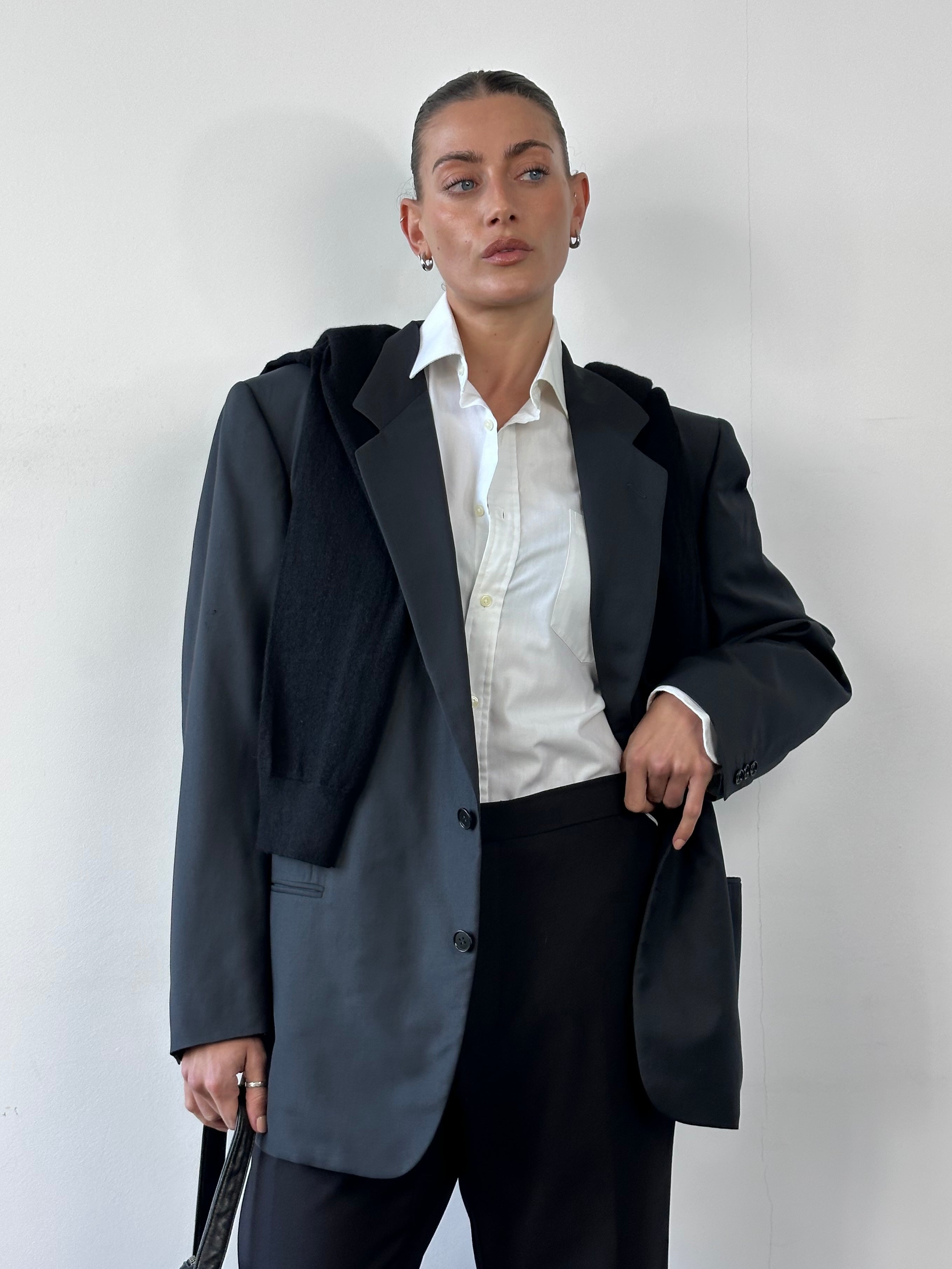 Yves Saint Laurent 70s wool single-breasted blazer in size 44R/XL, featuring classic tailored fit and vintage-inspired design.