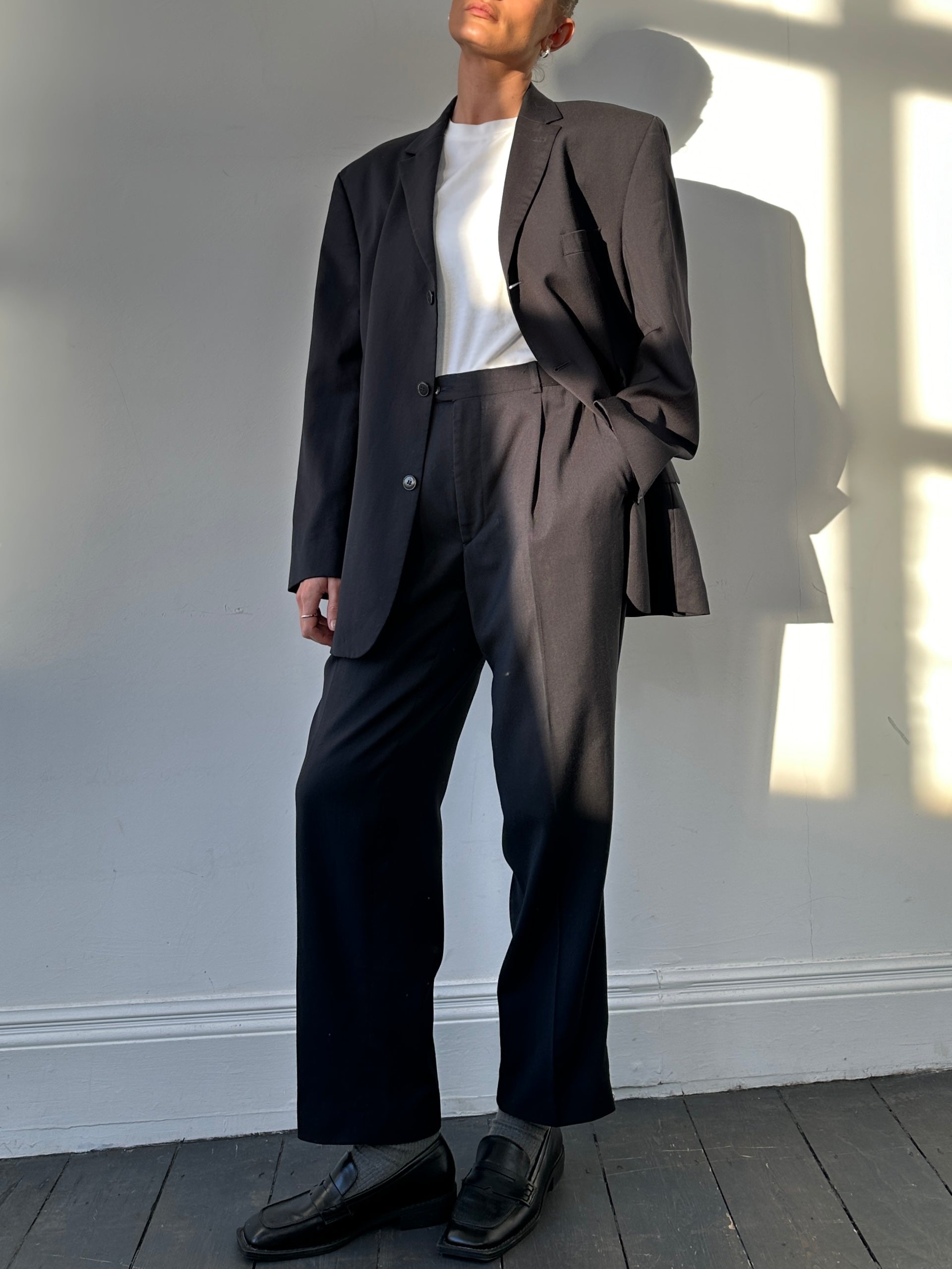 Pierre Cardin pure wool single-breasted jumpsuit in size 44S/W32, featuring tailored fit and classic design.
