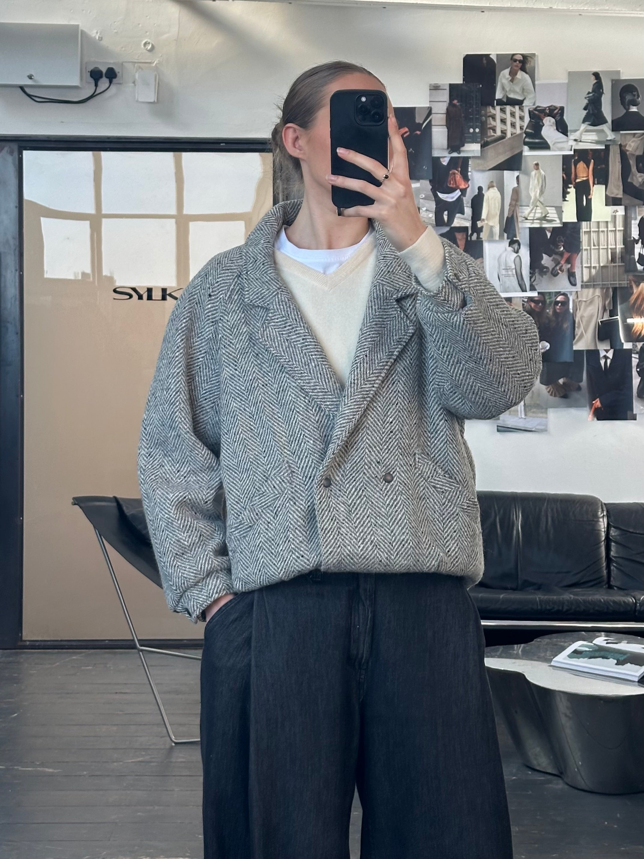 Vintage British 1980s pure wool herringbone bomber jacket in M/L size, featuring classic design and textured fabric.