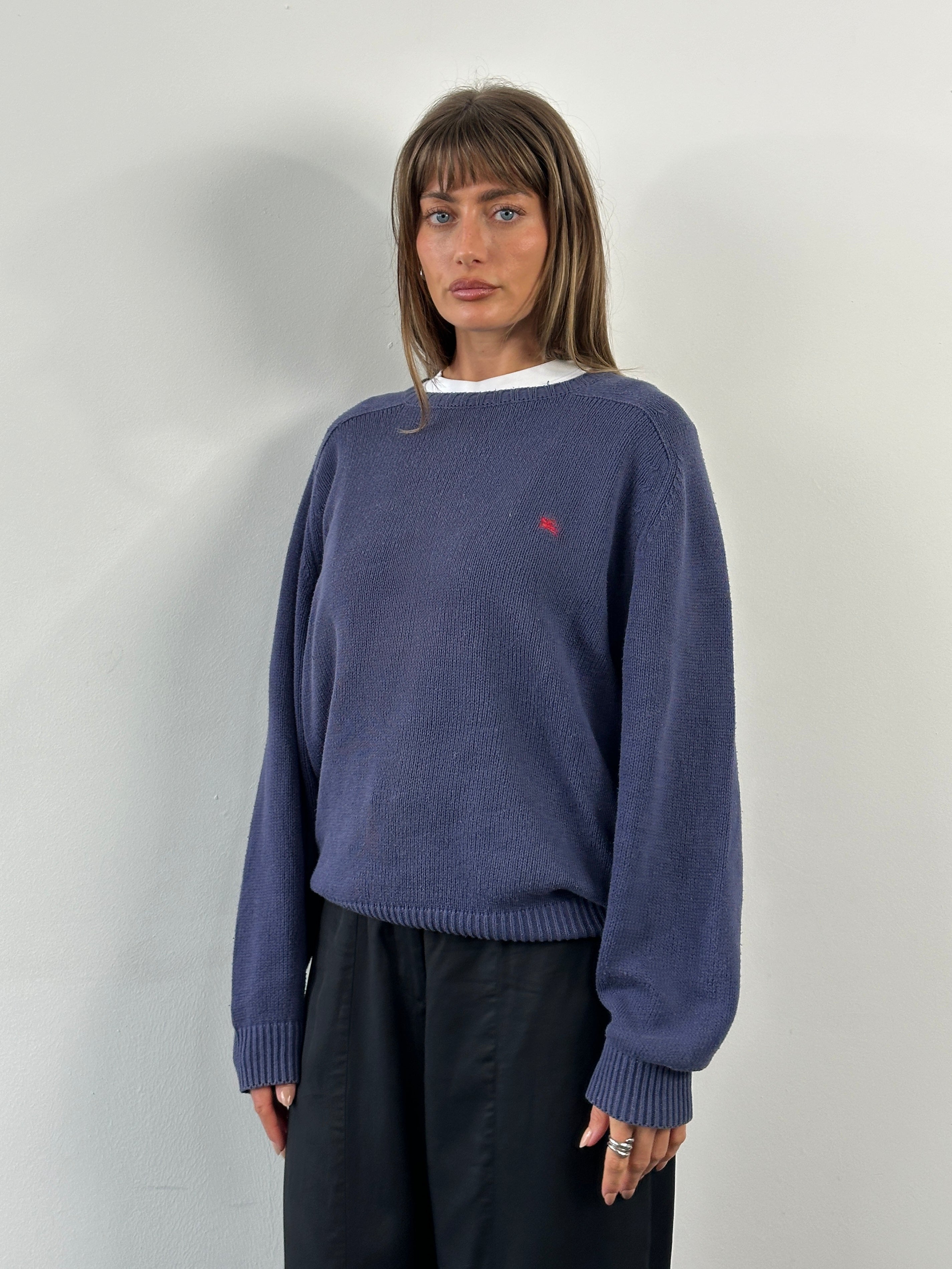 Burberry 1990s cotton logo knitted jumper in black, featuring classic branding and a cozy, textured knit design.
