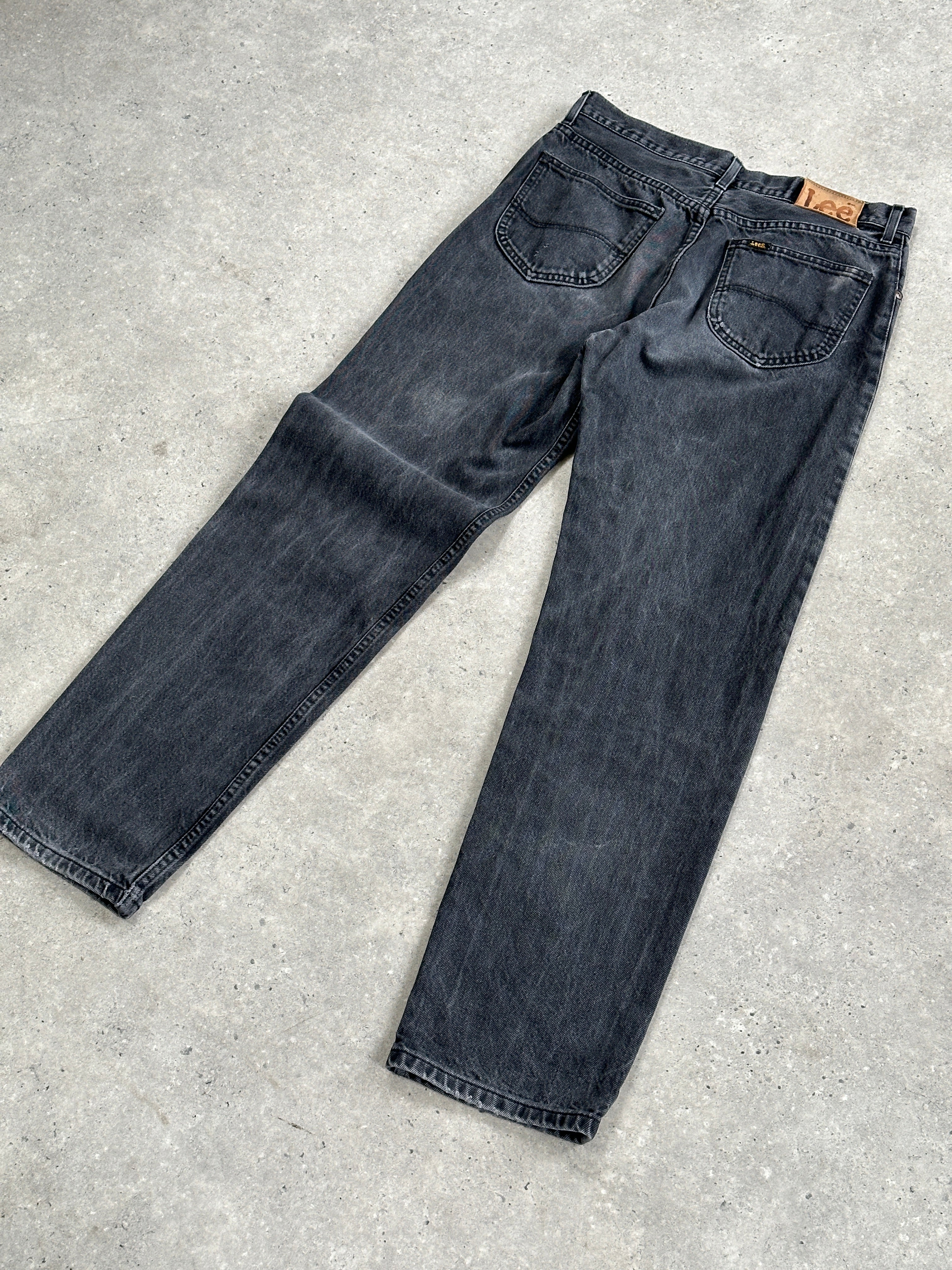 Lee high waisted straight leg denim jeans in W32, front view showing classic blue color and structured fit.