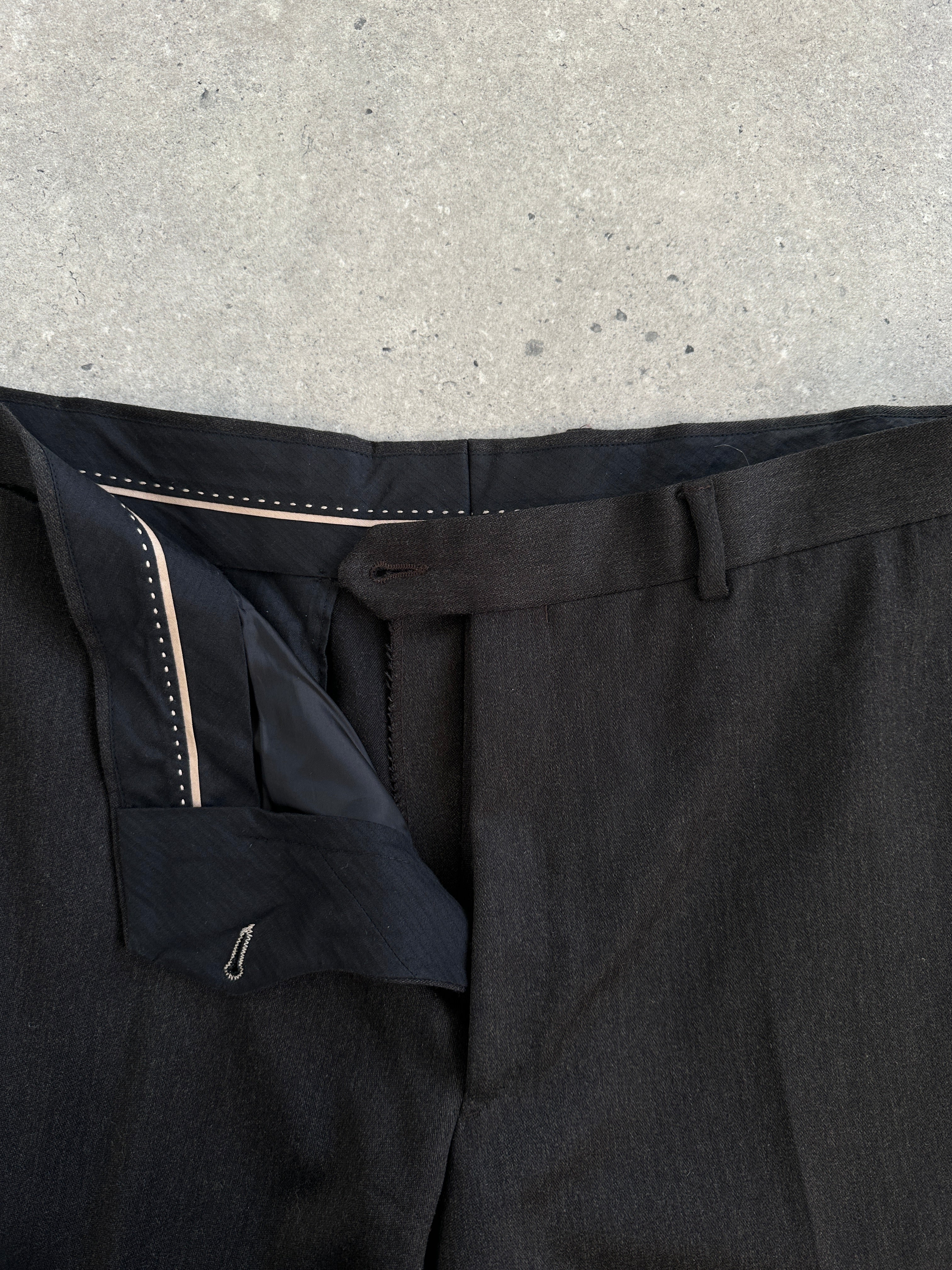 Vintage vintage brushed wool straight leg tailored trousers in size W36, shown on a hanger with a focus on the fabric and fit.