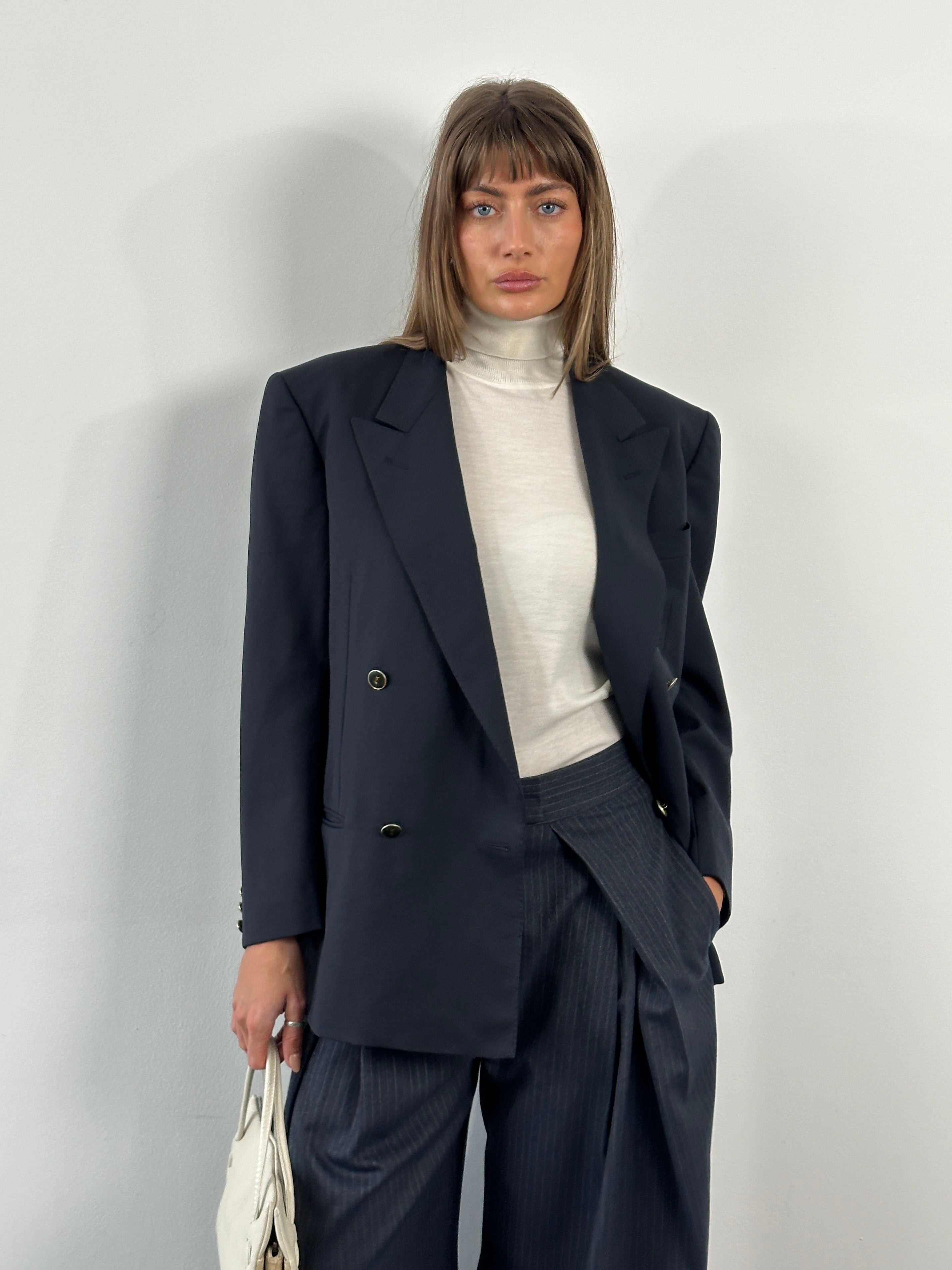 Yves Saint Laurent 1990s bespoke wool double-breasted blazer in size 38R/M, featuring classic tailored design and button details.
