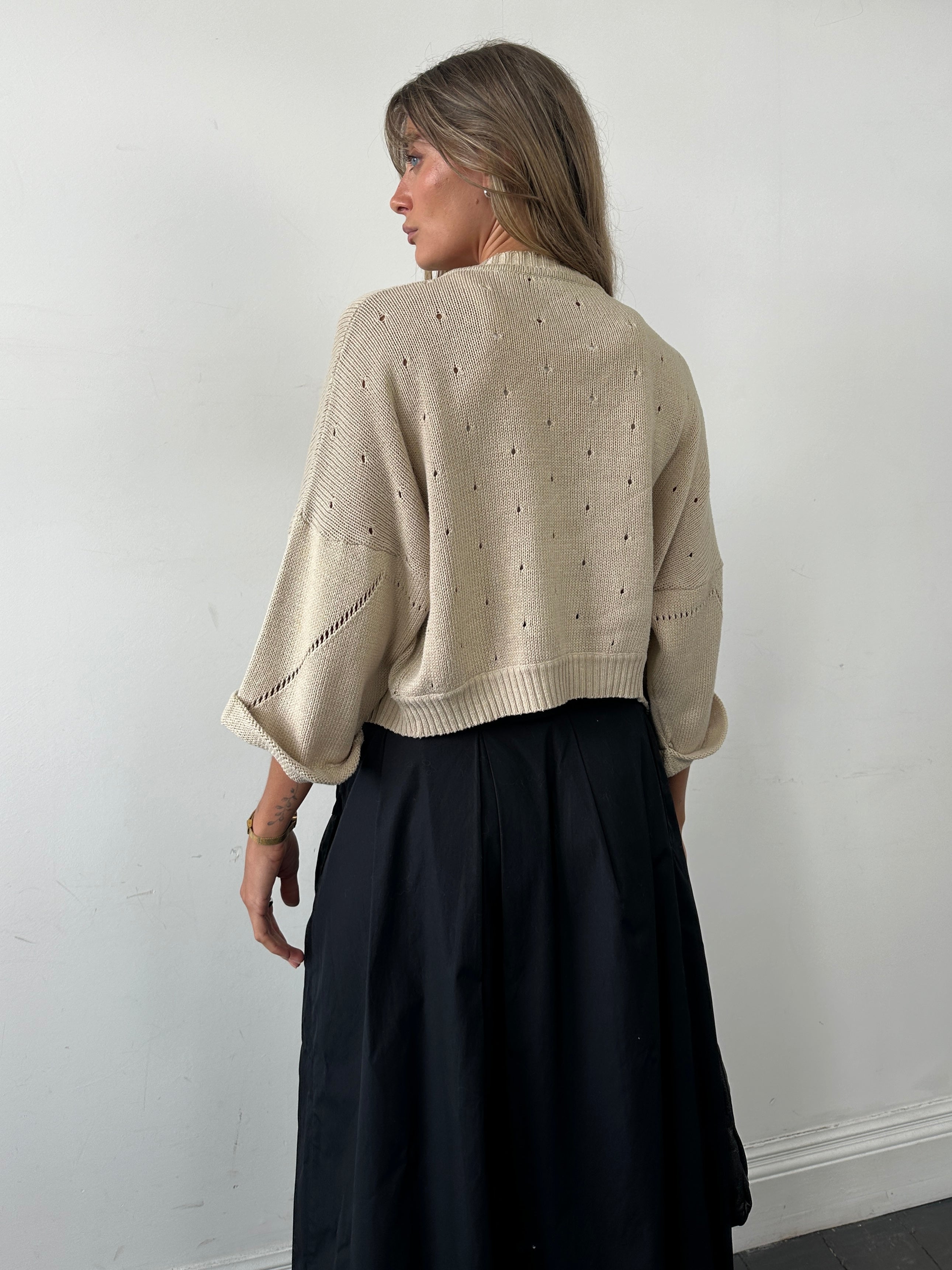 Vintage Italian vintage pure cotton cardigan in size M, featuring classic knit texture and button-front design.
