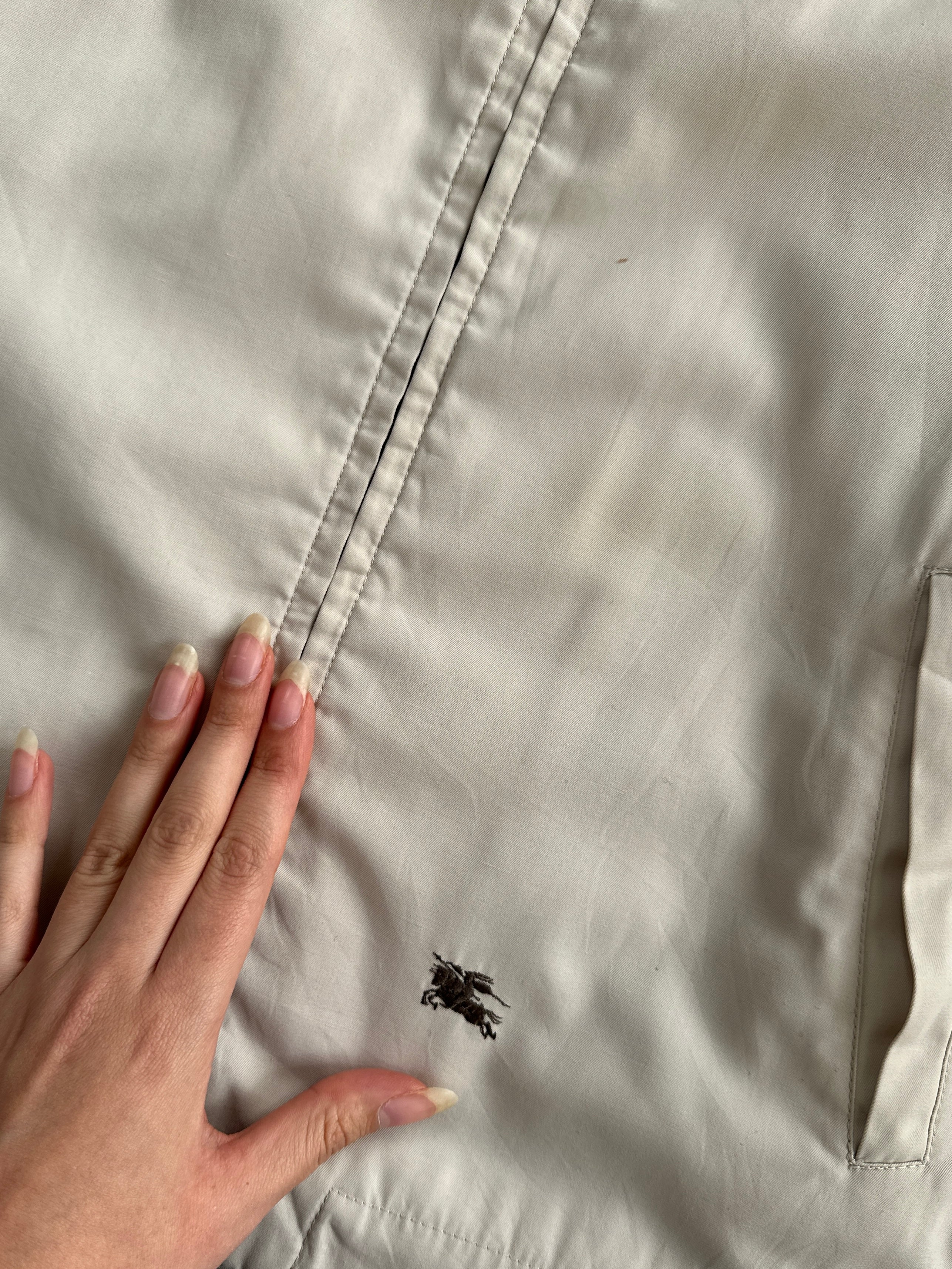 Burberry Nova Check logo bomber jacket in size L, featuring classic check pattern, ribbed cuffs, and front zip closure.