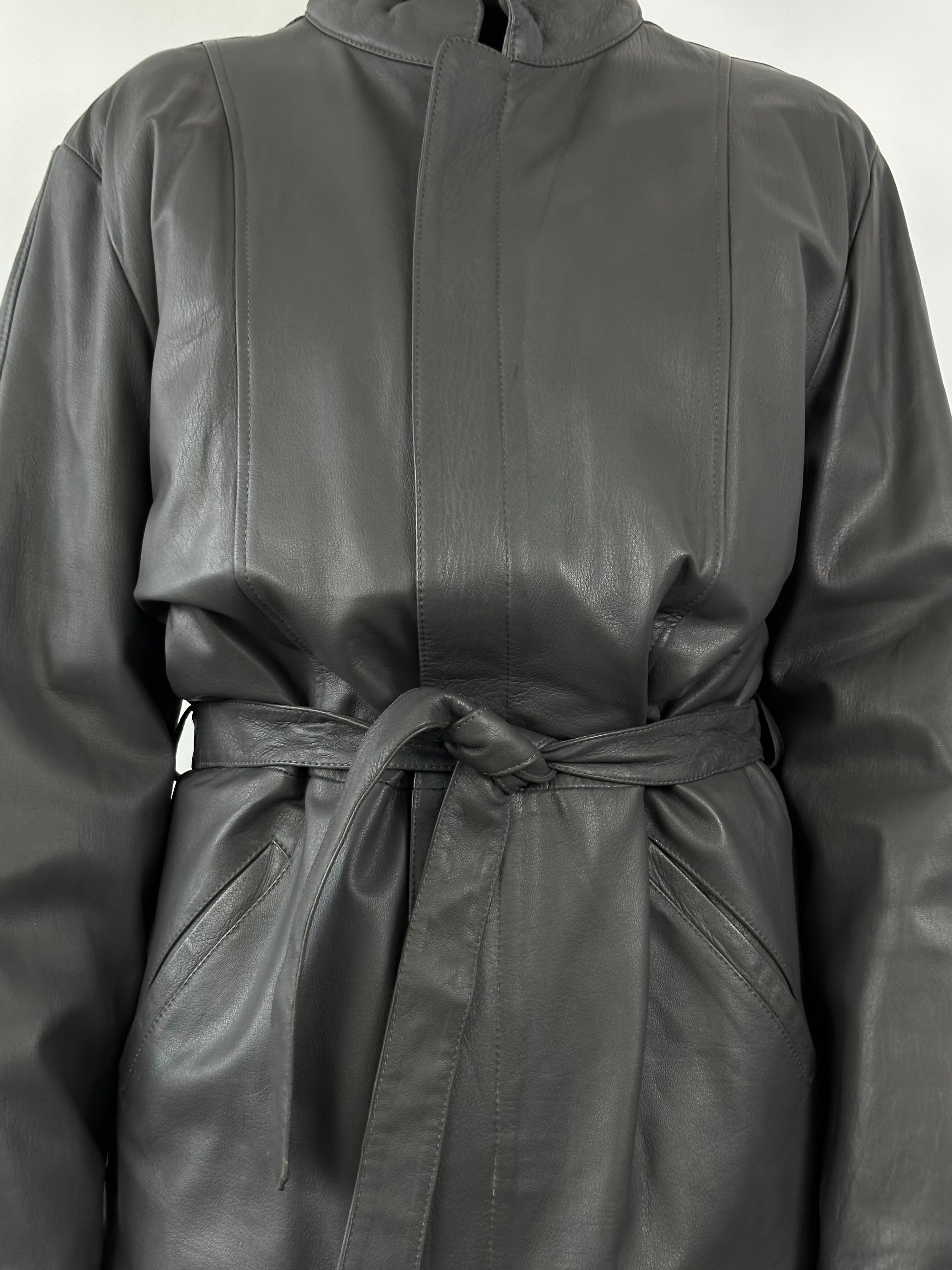 Vintage Italian leather belted jacket in XL, featuring classic design and authentic craftsmanship.