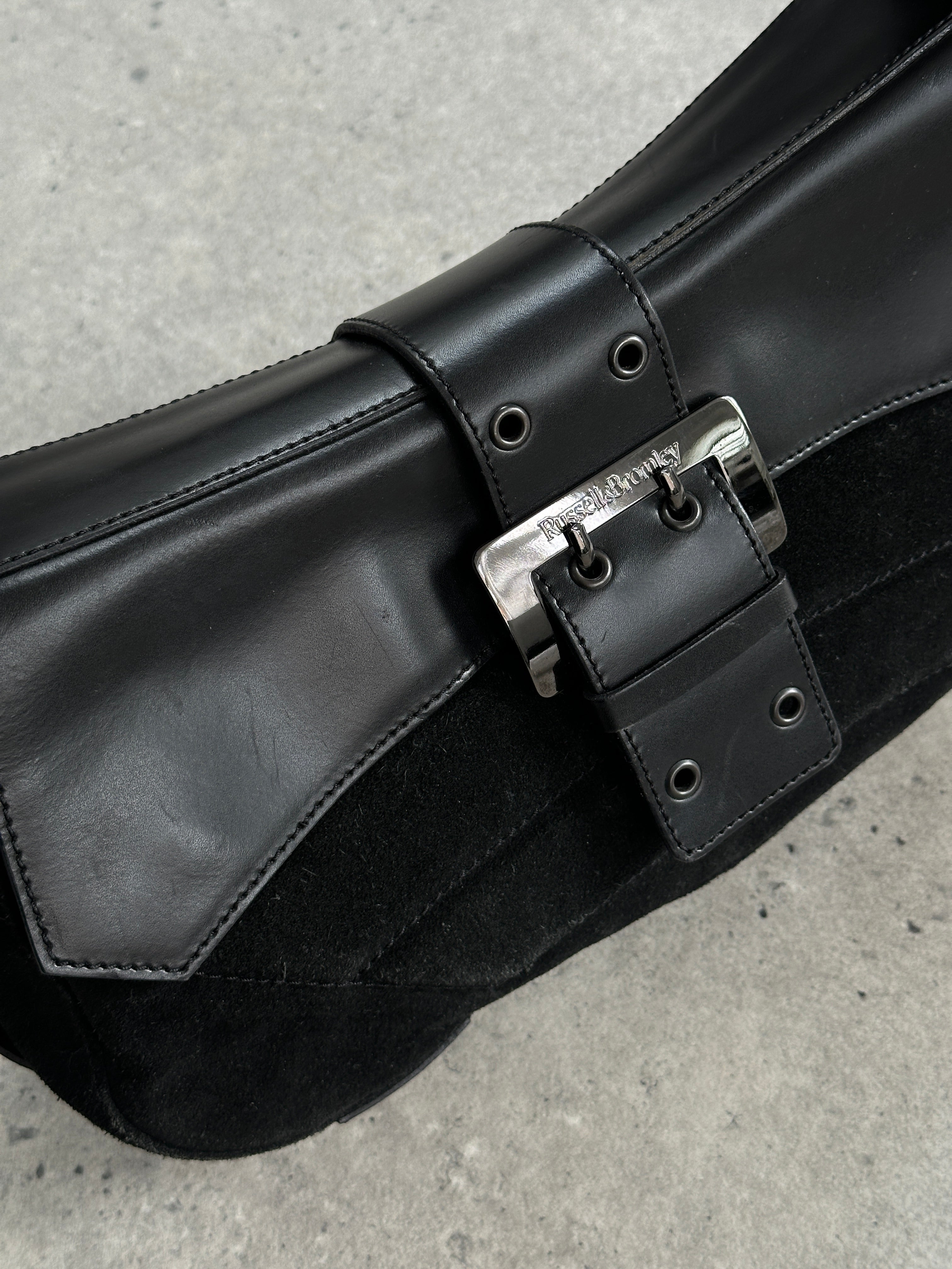 Vintage Russell & Bromley 00s leather suede shoulder bag with a classic design and adjustable strap, featuring a spacious interior.