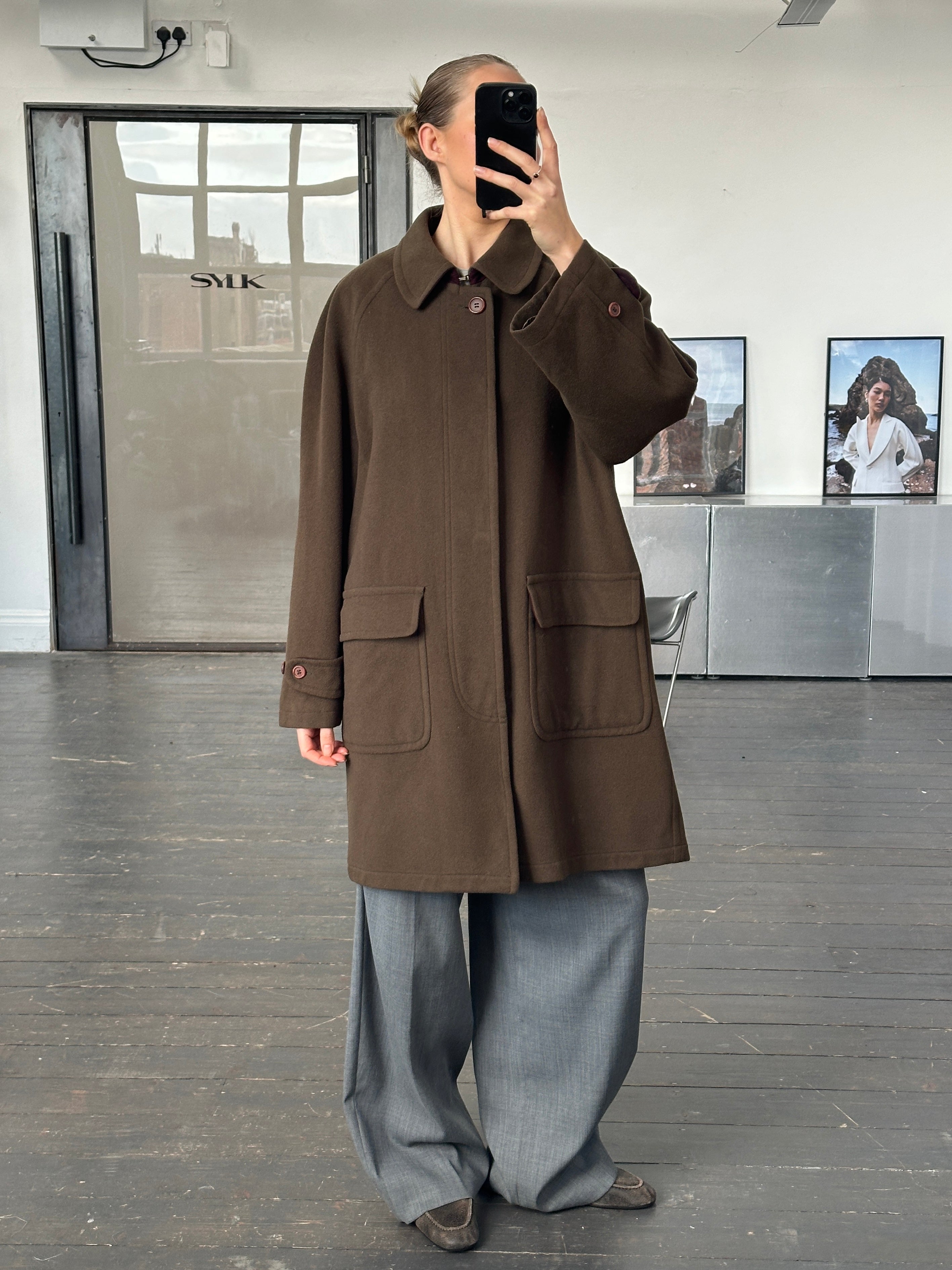Missoni 1990s wool coat with concealed placket, oversized XXL fit, featuring colorful knit pattern and classic design.
