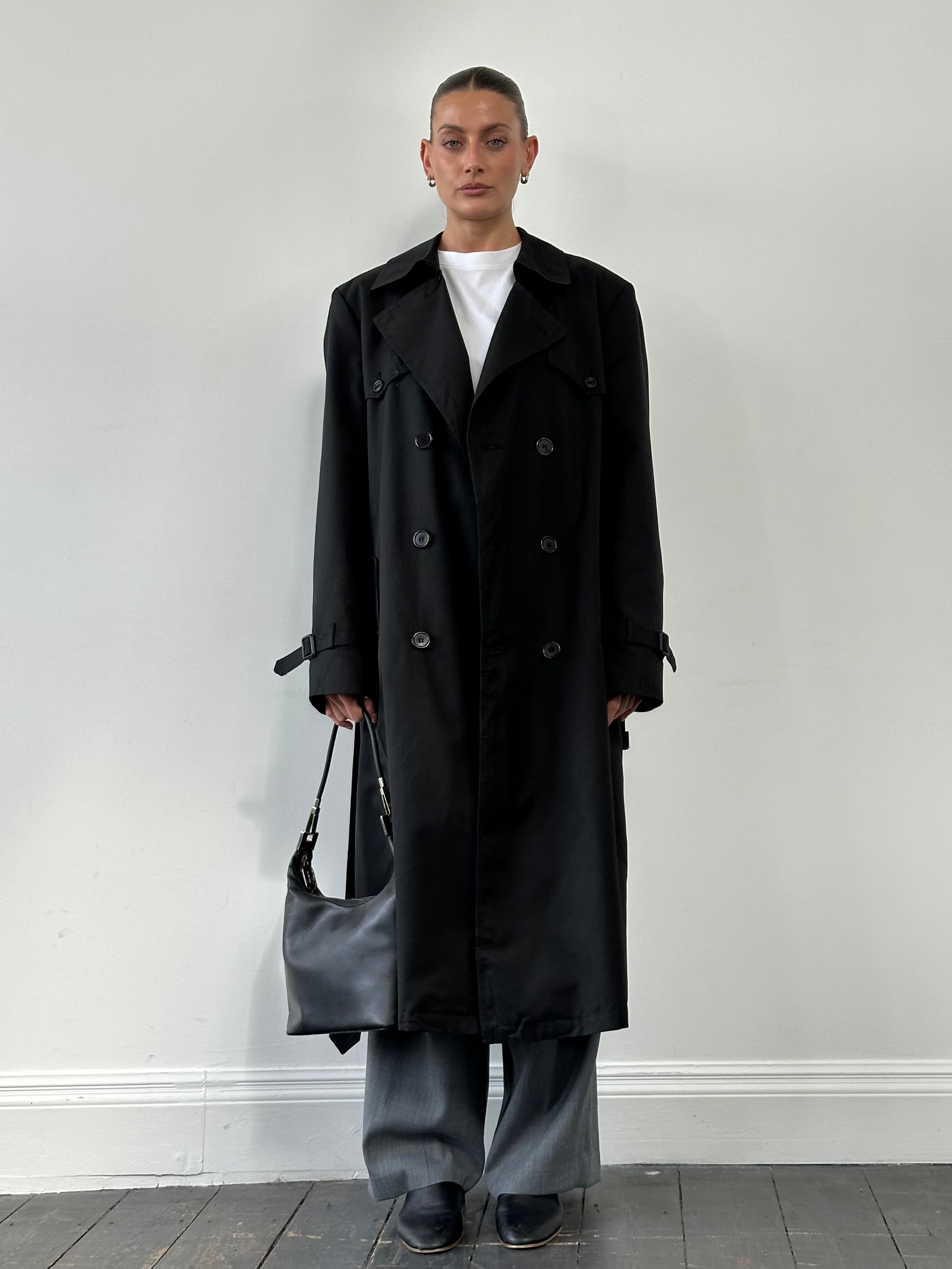 Christian Dior Monsieur double-breasted trench coat in XL, beige fabric with classic lapels and button details.