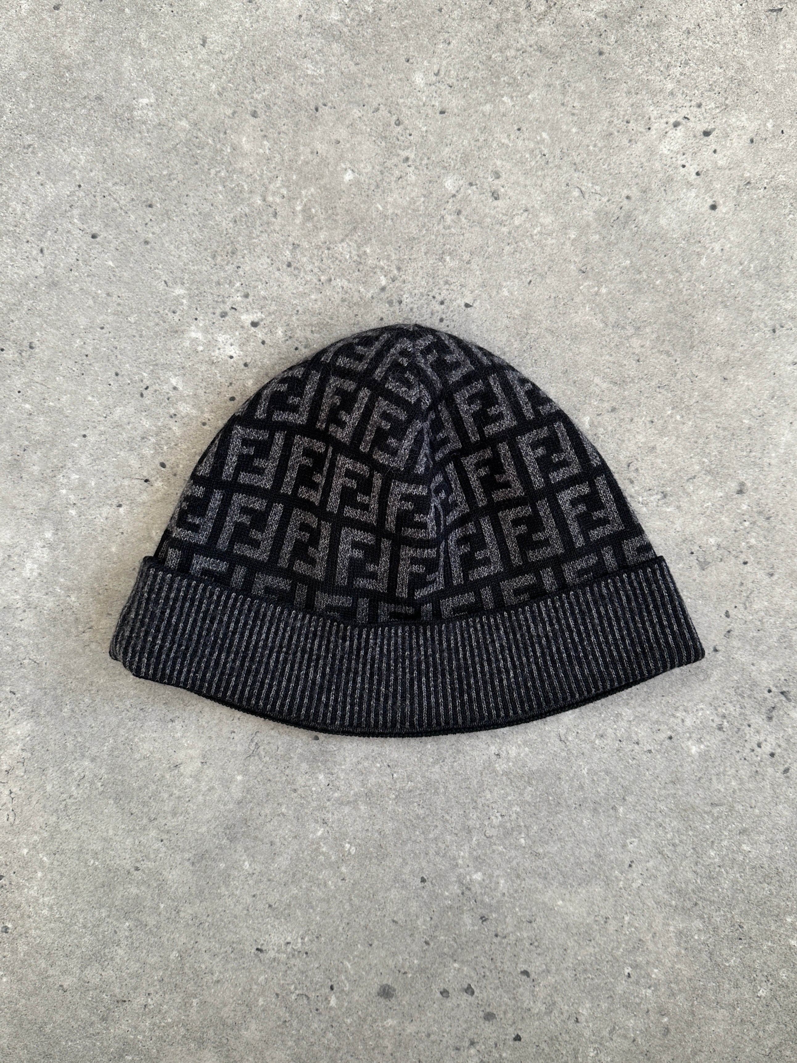 Fendi FF monogram print beanie hat with knit design, featuring the iconic logo pattern and a snug, stylish fit.
