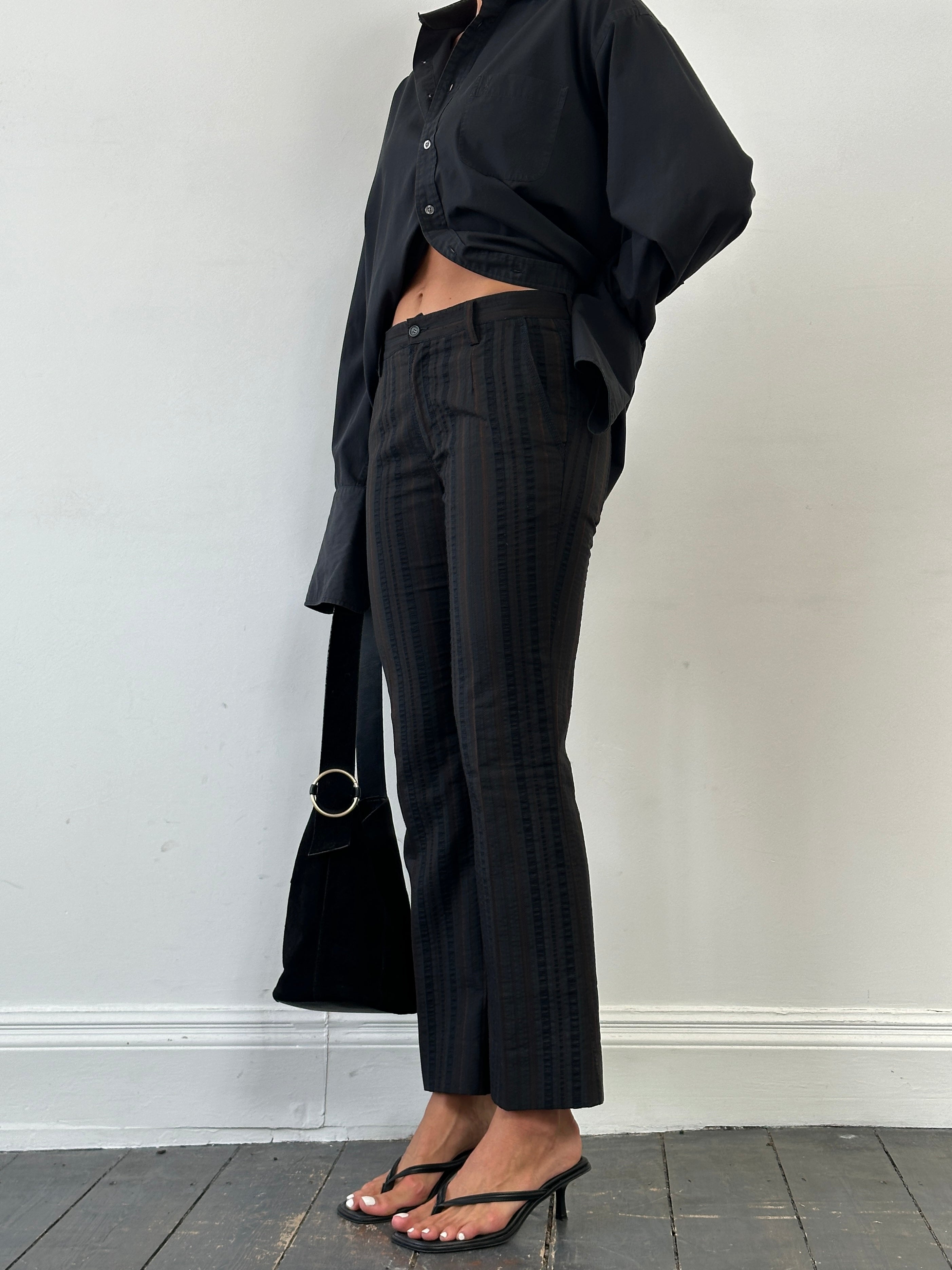 Roberto Cavalli Just Cavalli striped mid-rise flared trousers in W28, featuring bold vertical black and white stripes.