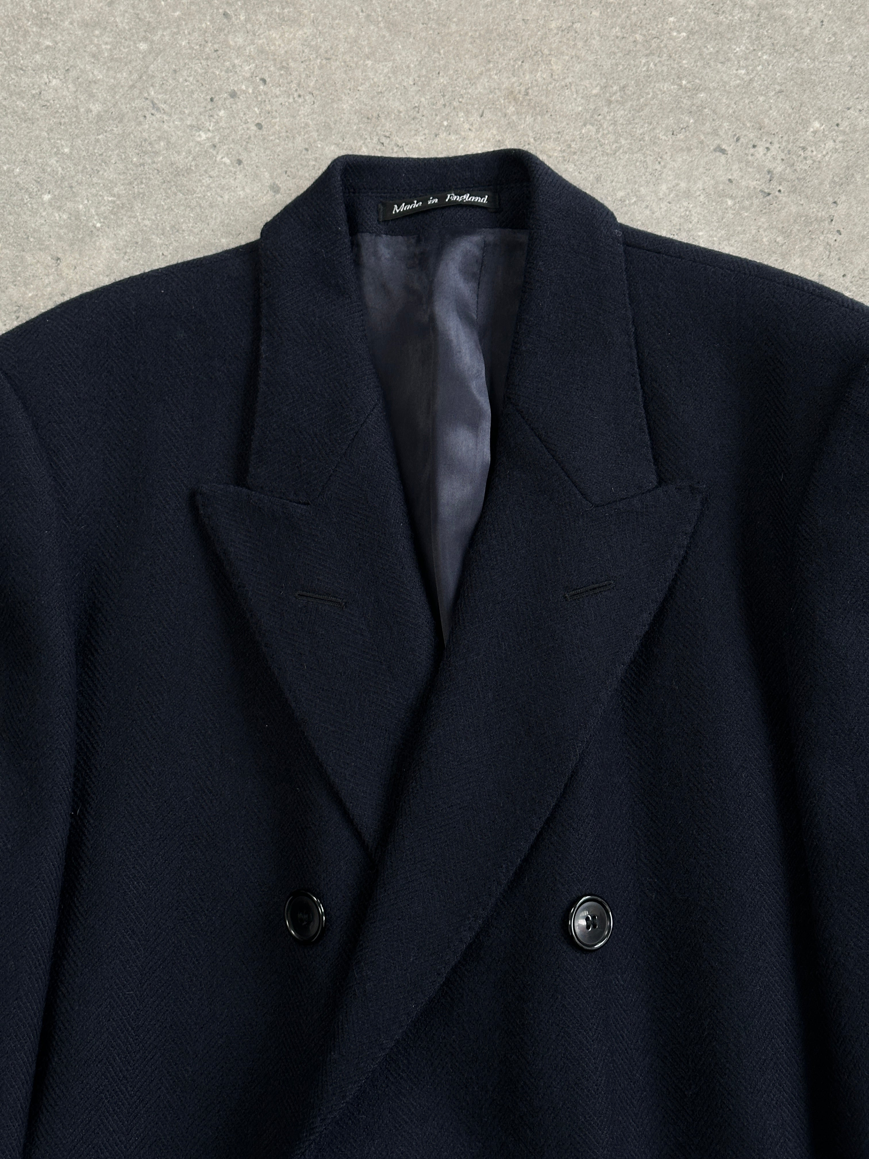 Vintage British 1990s pure wool double-breasted coat in XL, classic vintage style with tailored collar and button details.