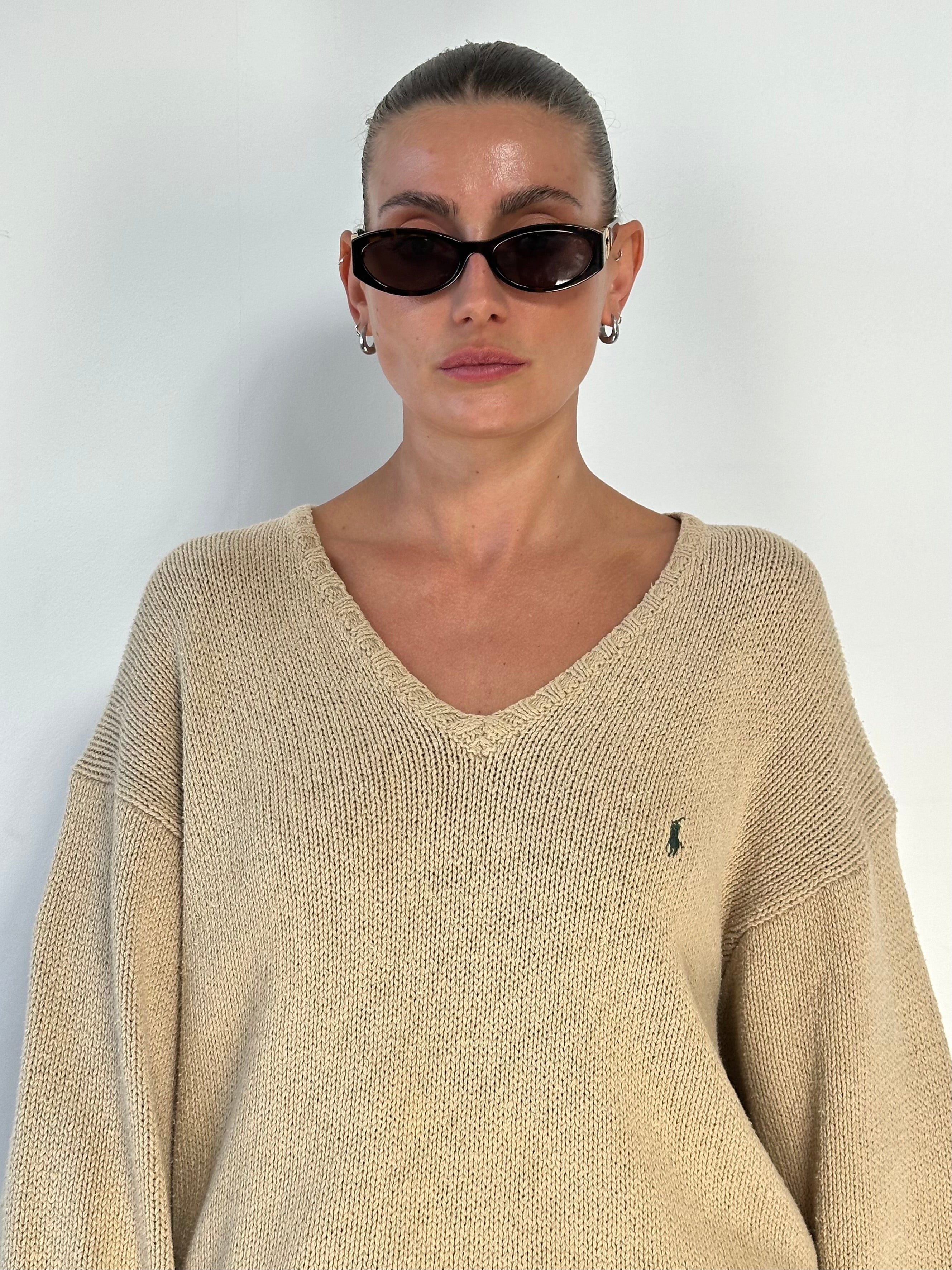 Ralph Lauren Polo pure cotton knitted jumper in XL with embroidered logo, featuring a classic crewneck design and ribbed cuffs.