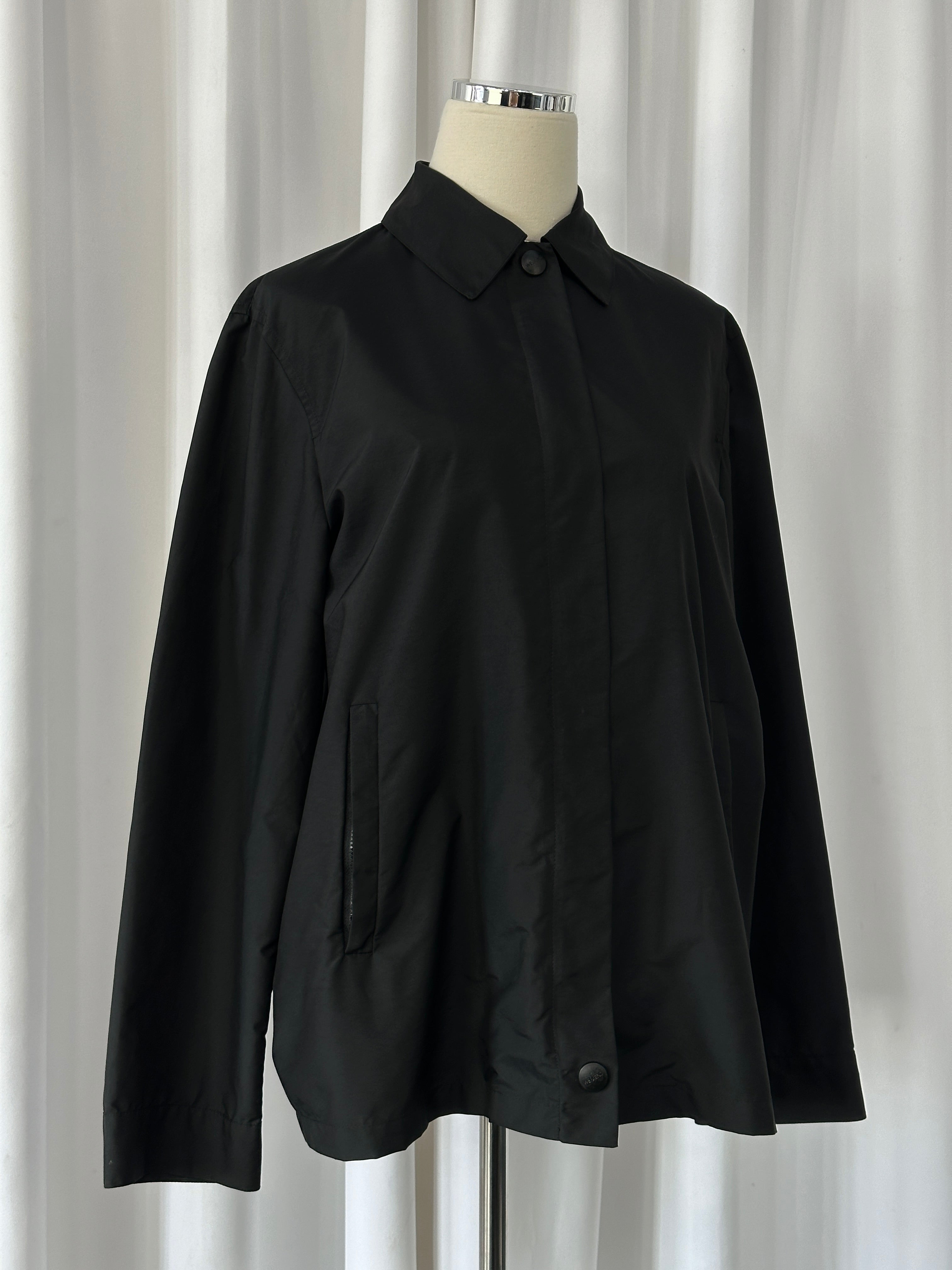 Max Mara Weekend 2000s concealed placket bomber jacket in black, showing the front view with ribbed collar and zip closure.