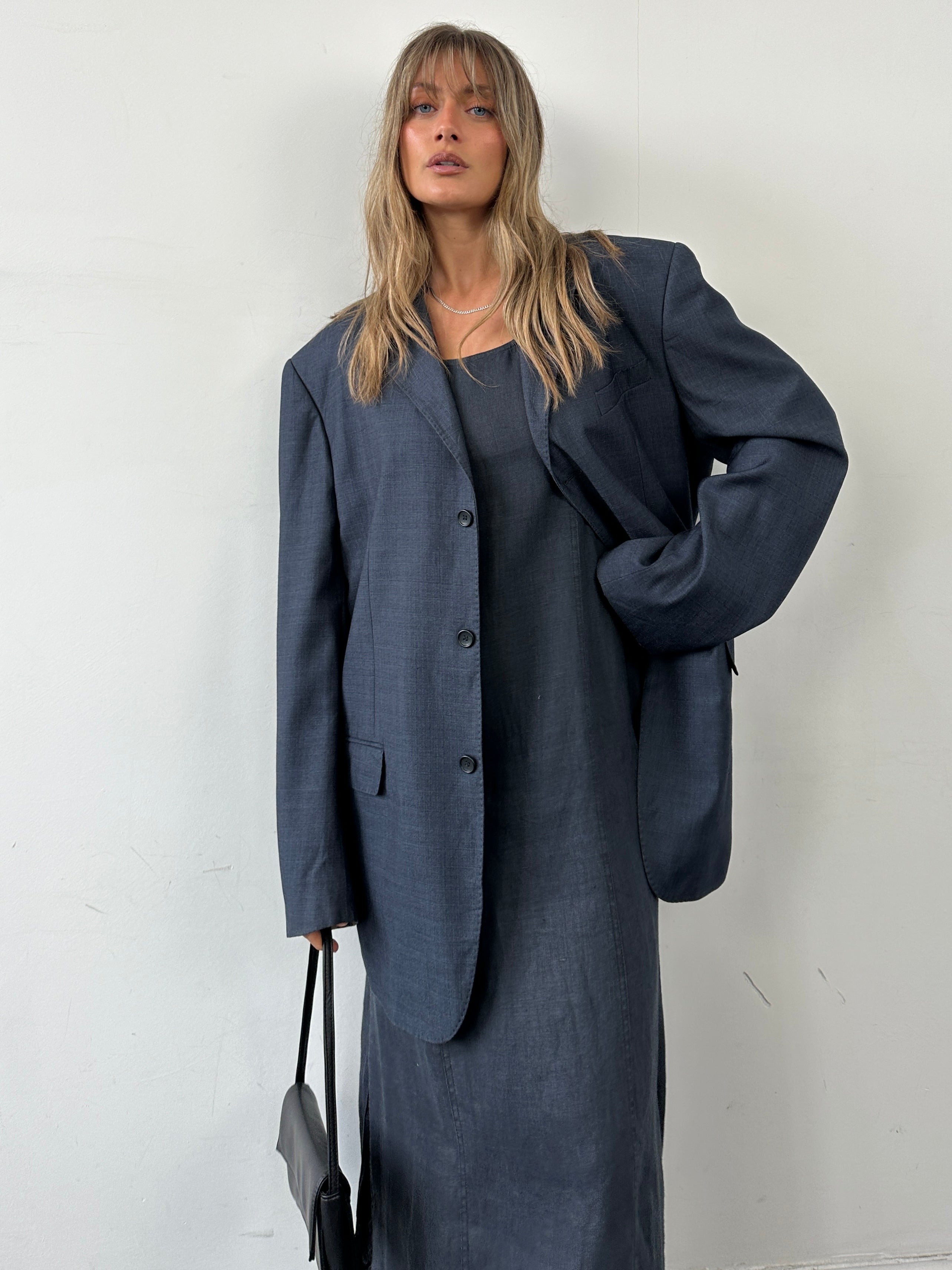 Vintage 1990s wool single-breasted blazer in size 48R/XXXL, classic men's tailored blazer with a timeless design.