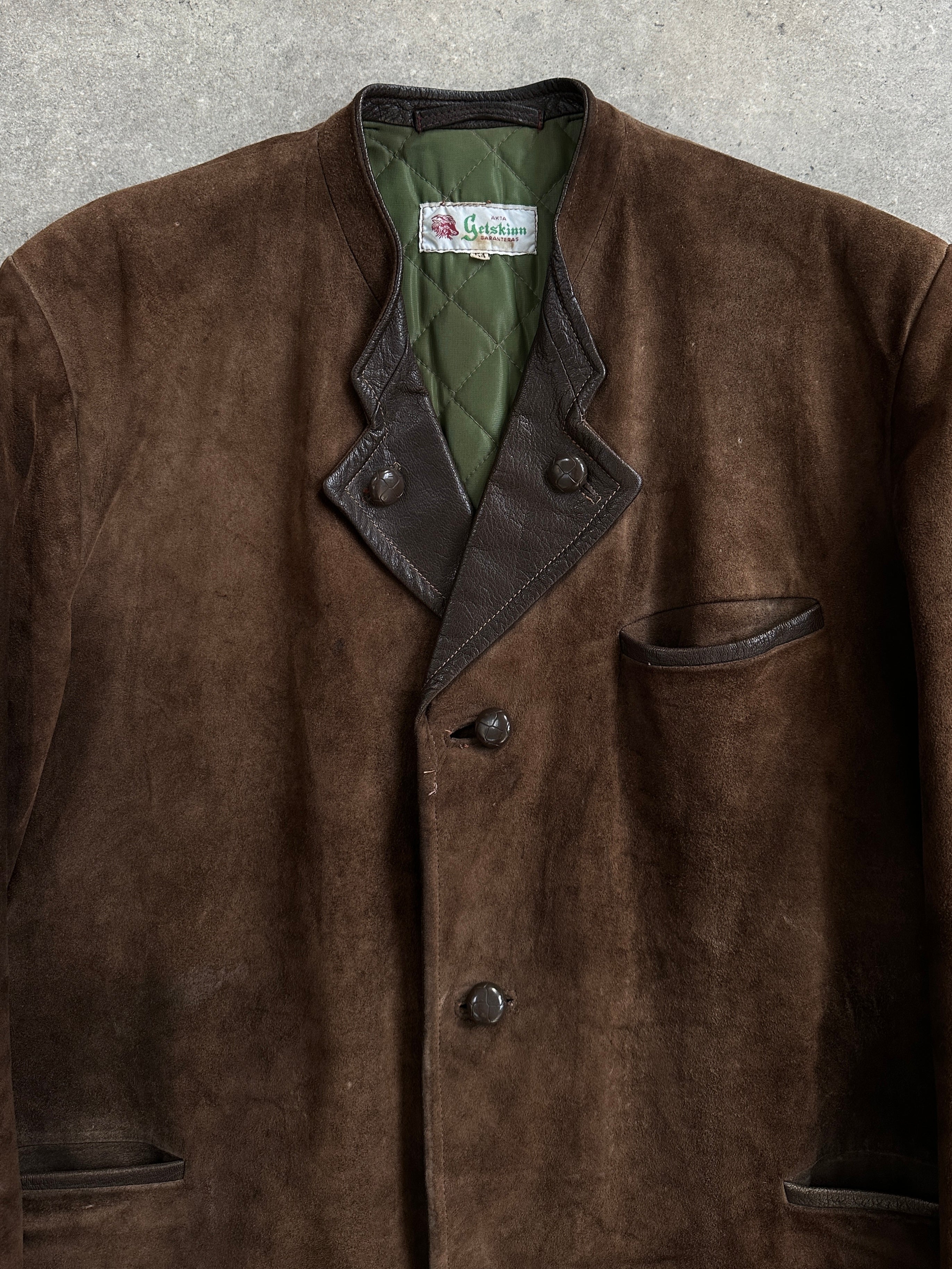 Vintage 1970s suede leather jacket in XL, classic retro style with soft, worn-in texture and vintage craftsmanship.