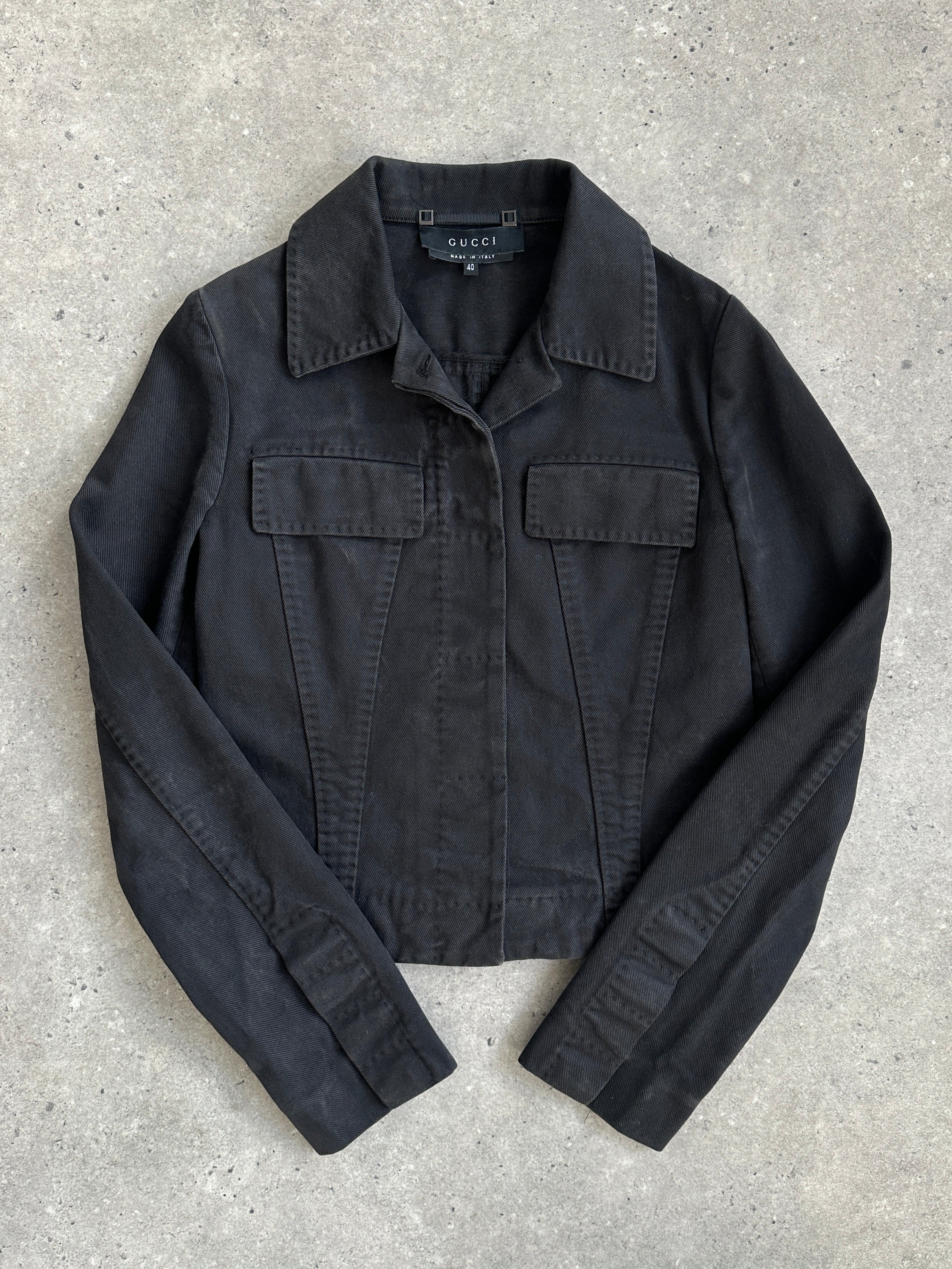 Gucci by Tom Ford 2002 fitted denim jacket in XS, showcasing classic blue denim with stylish stitching and button details