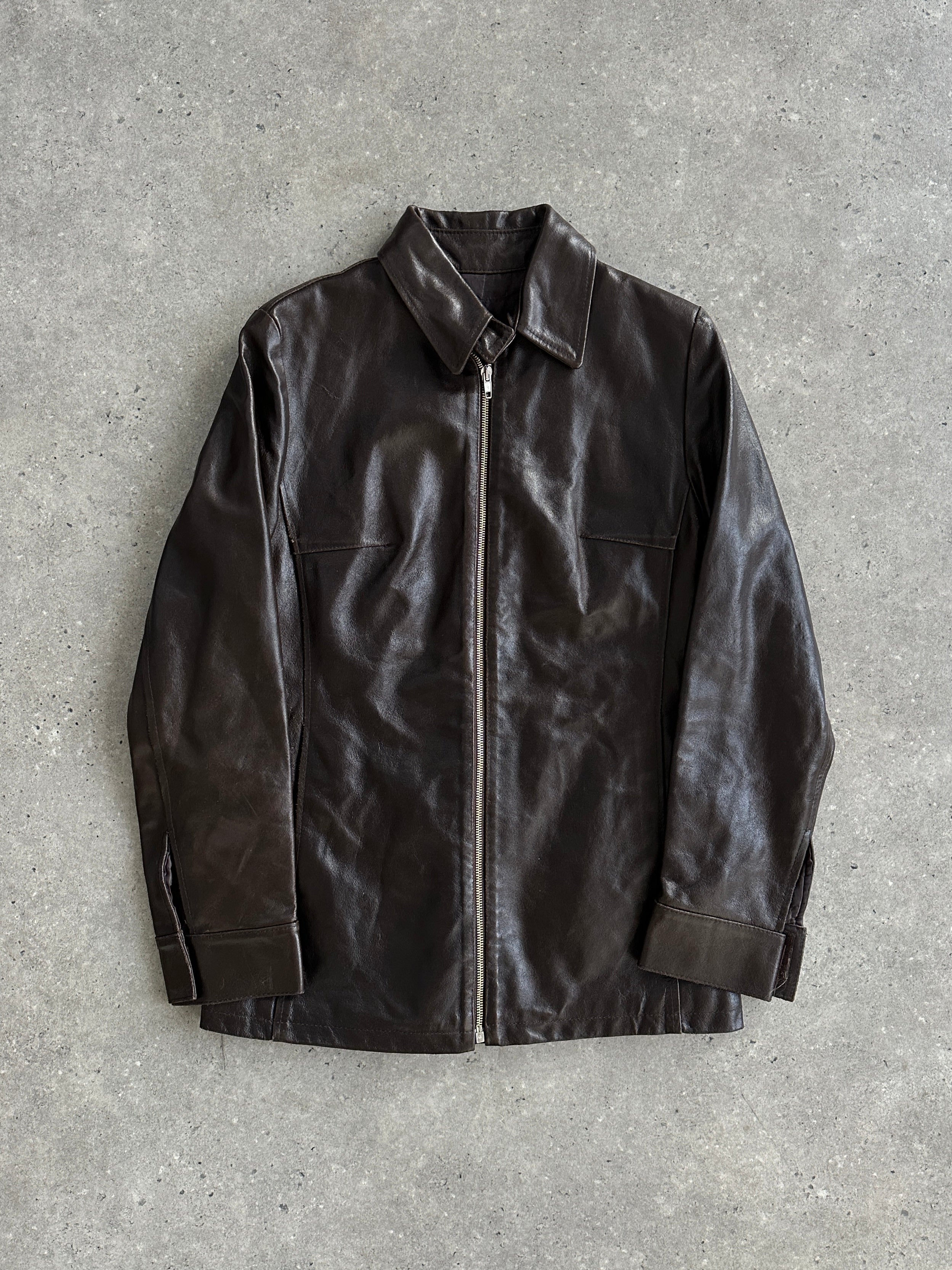 Vintage brand vintage smooth leather jacket in size small, shown on a hanger with detailed stitching and classic collar design.