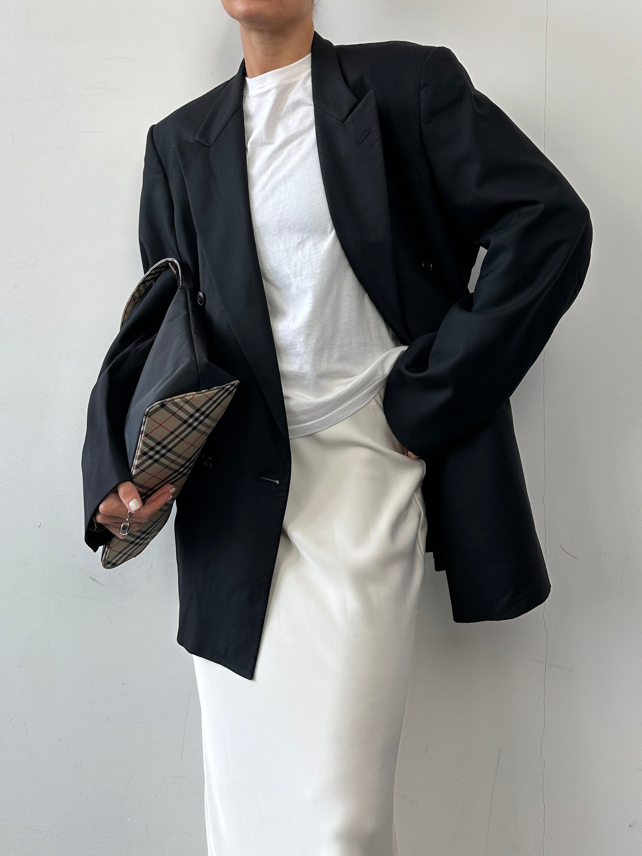 Christian Dior pure wool double-breasted blazer in size L/XL, tailored fit, navy blue with classic lapel and button details.