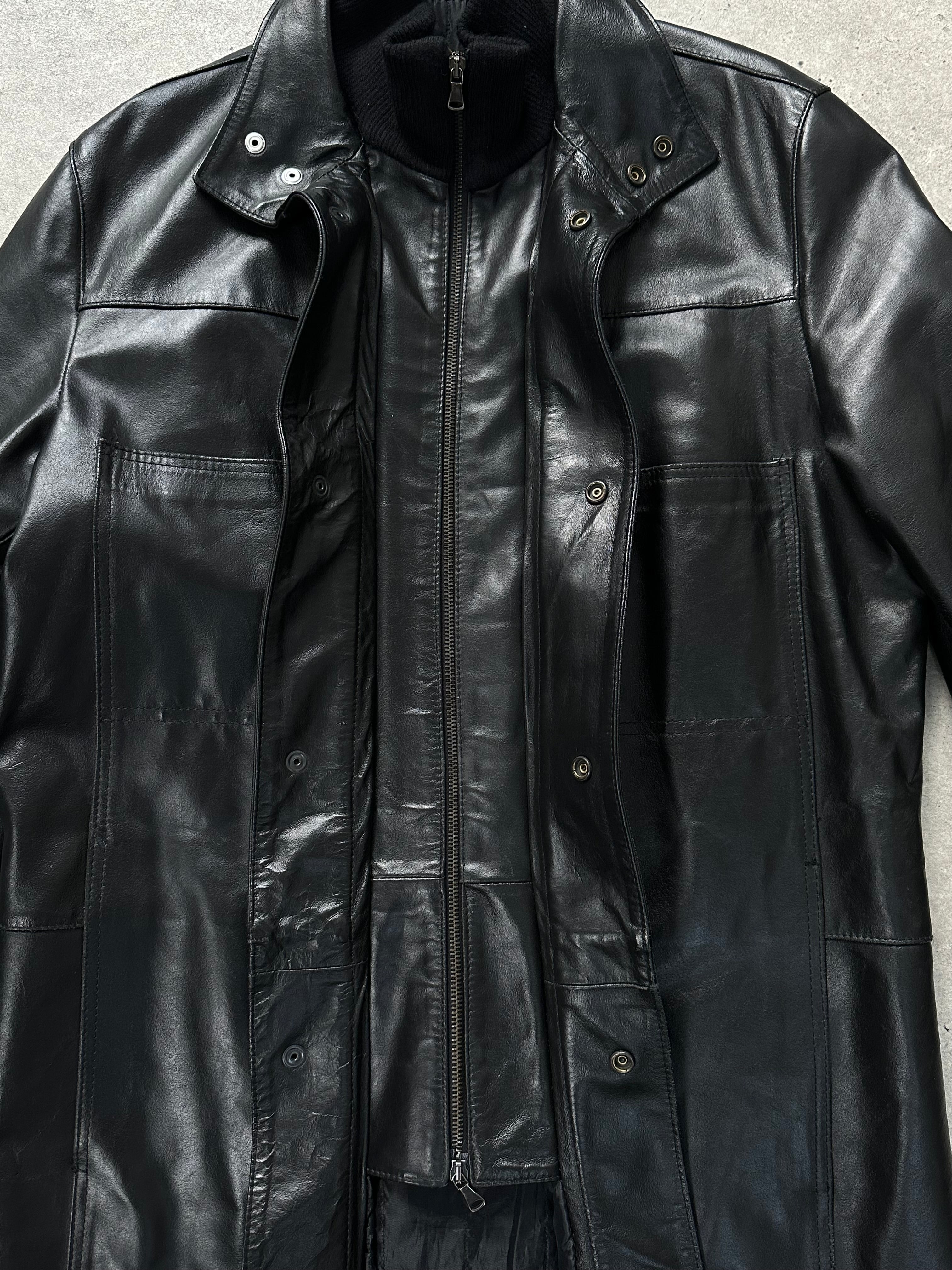 Vintage Italian 1990s leather trench coat with funnel neck, oversized fit, classic design, in rich brown leather.