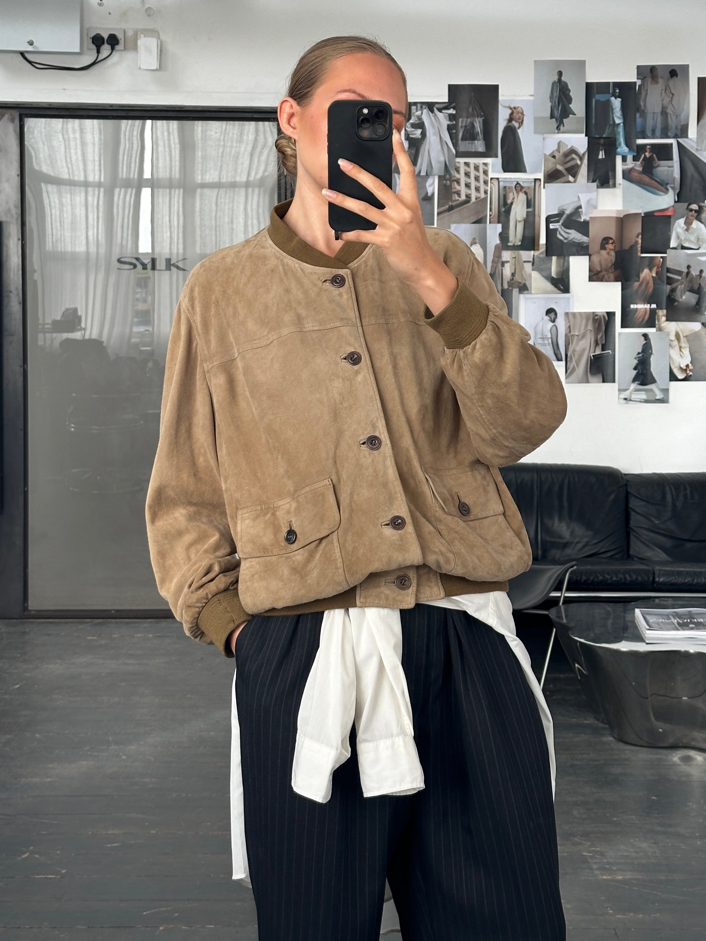 Vintage 1990s suede leather bomber jacket in size large, featuring classic design and retro style.