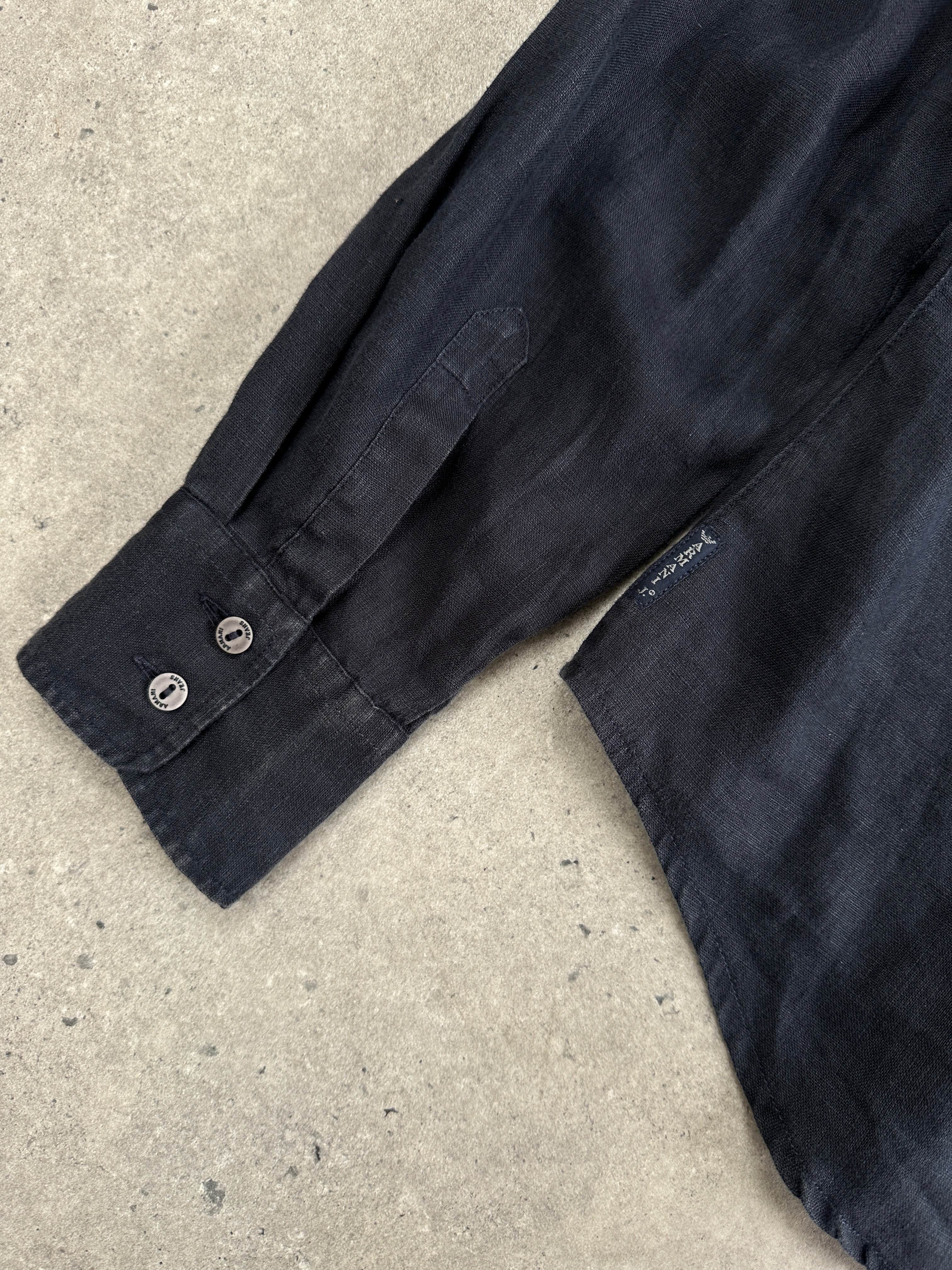 Armani Jeans 2000s pure linen shirt in size M, displayed flat with collar and buttons visible, light and breathable fabric.