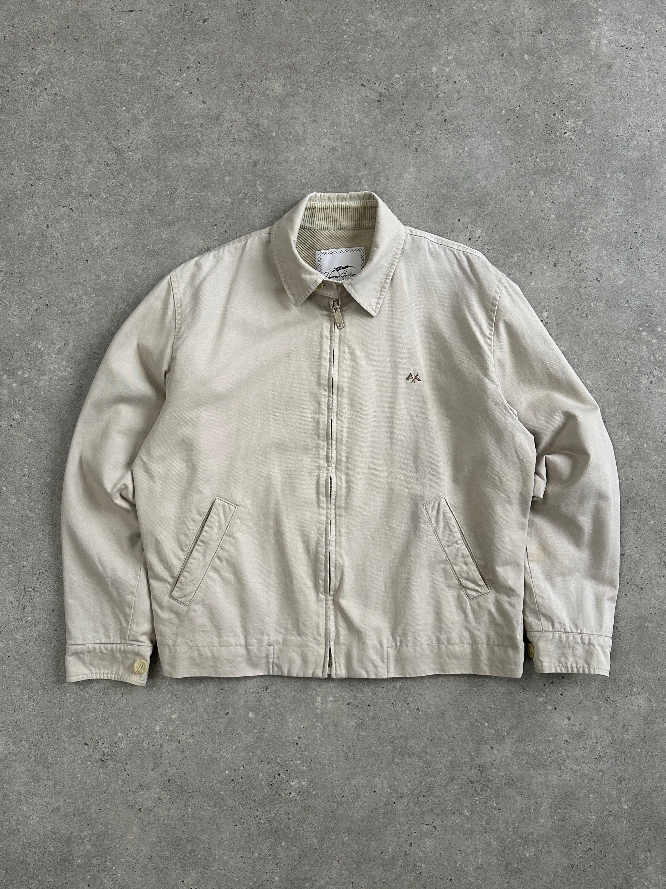 Thomas Burberry 1990s cotton Harrington bomber jacket in XL, featuring classic design and durable fabric, displayed on a hanger.